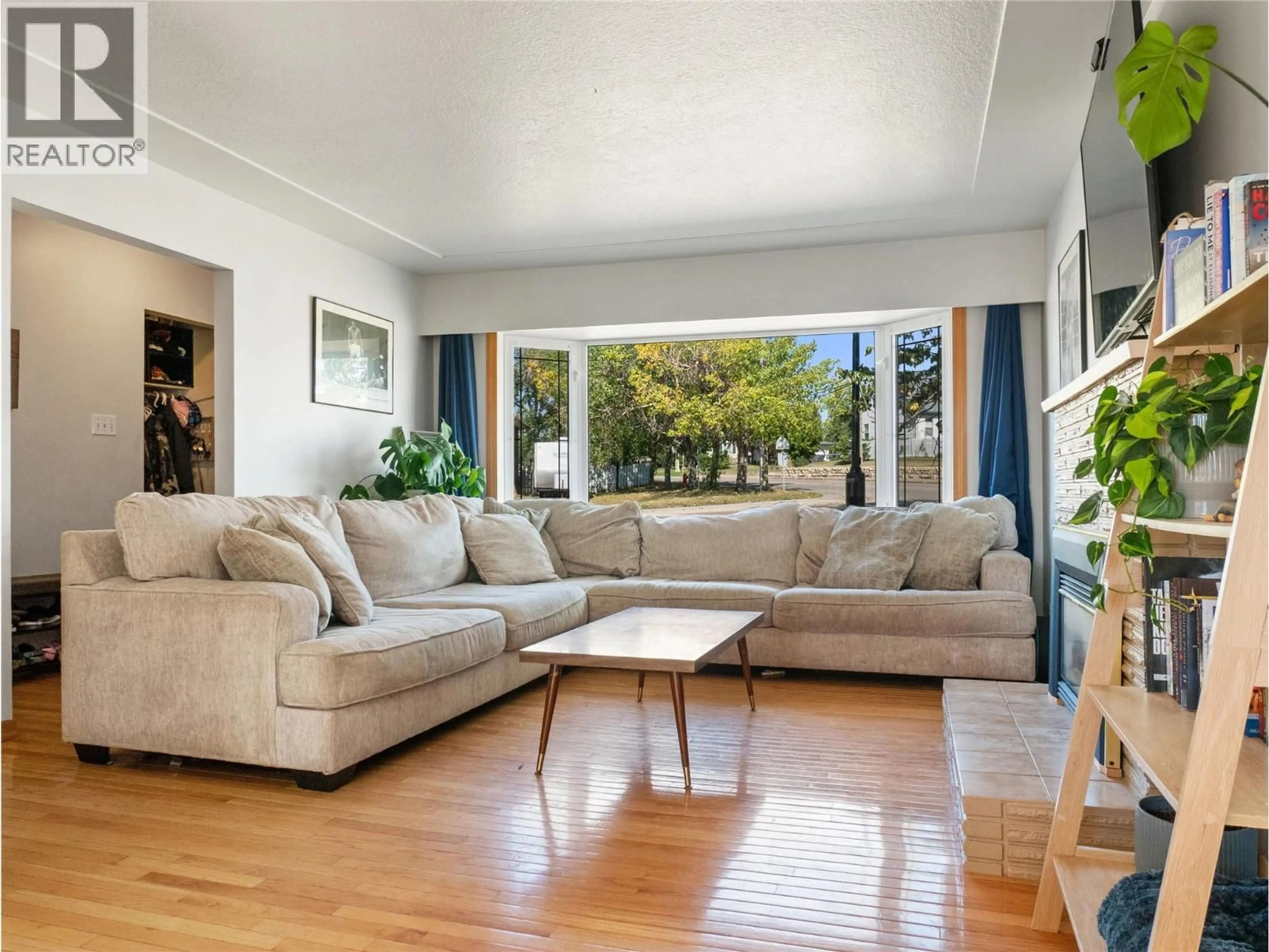 Living room with furniture, unknown for 1713 92 AVENUE, Dawson Creek British Columbia V1G1C6