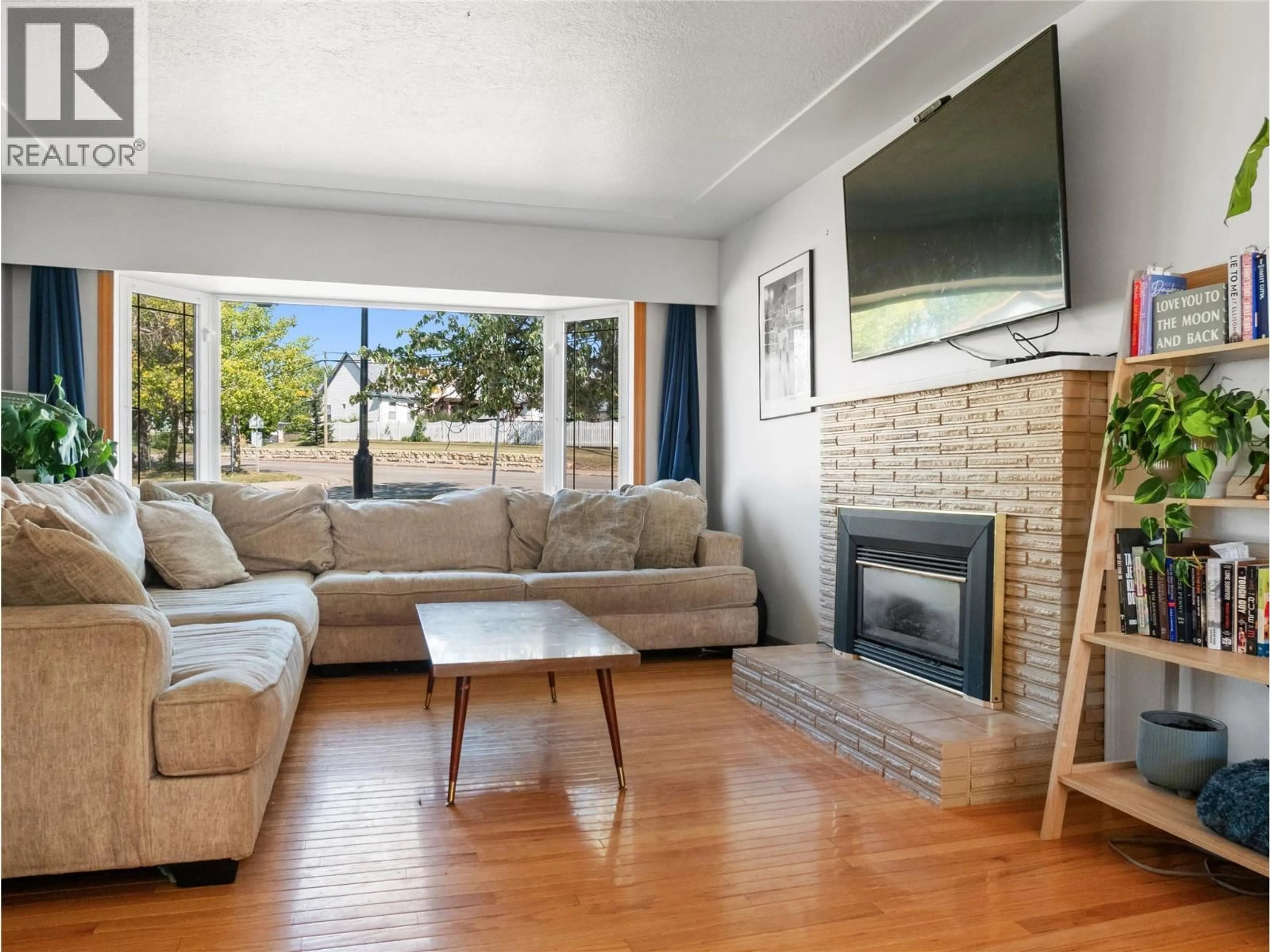 Living room with furniture, unknown for 1713 92 AVENUE, Dawson Creek British Columbia V1G1C6