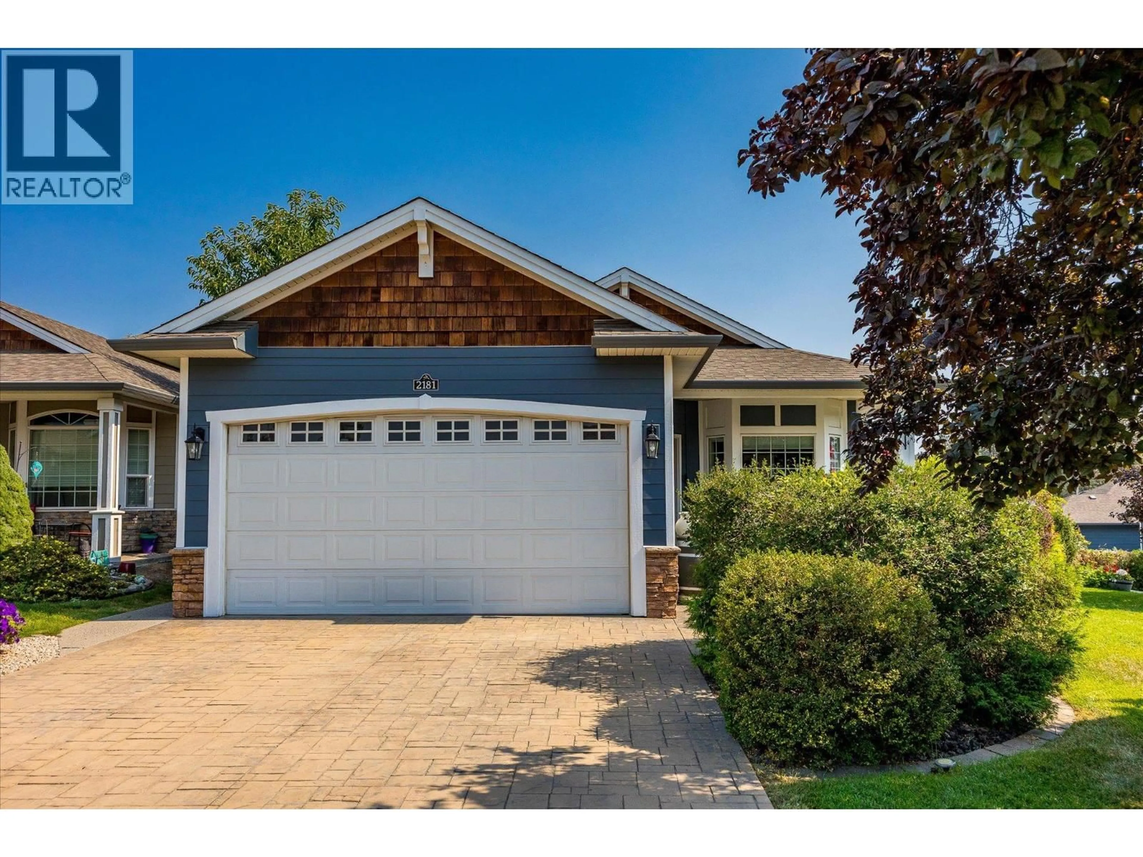 Home with vinyl exterior material, street for 2181 MIMOSA DRIVE, Westbank British Columbia V4T3A5