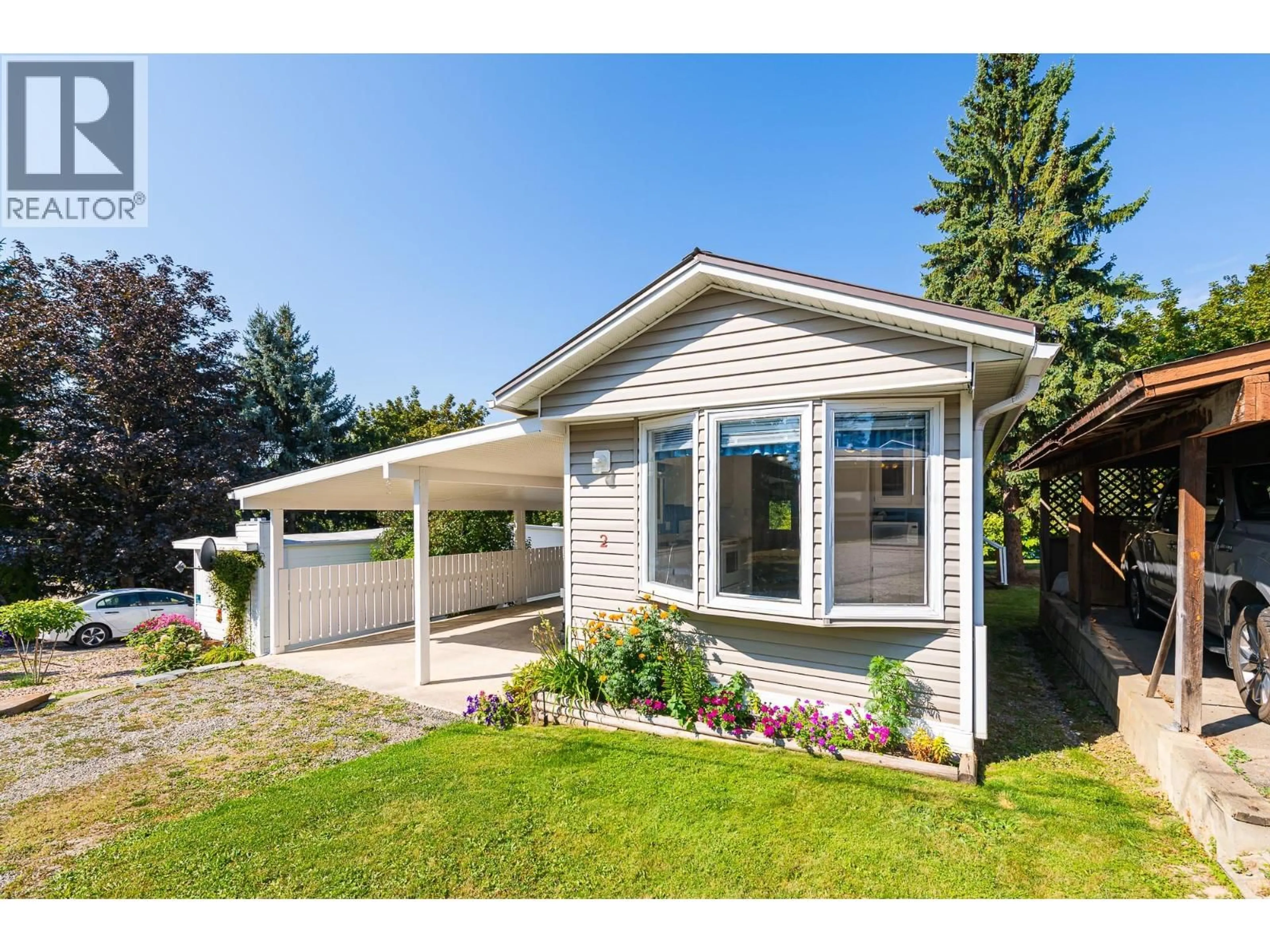 Home with vinyl exterior material, street for 2 - 1421 ERICKSON ROAD, Creston British Columbia V0B1G1