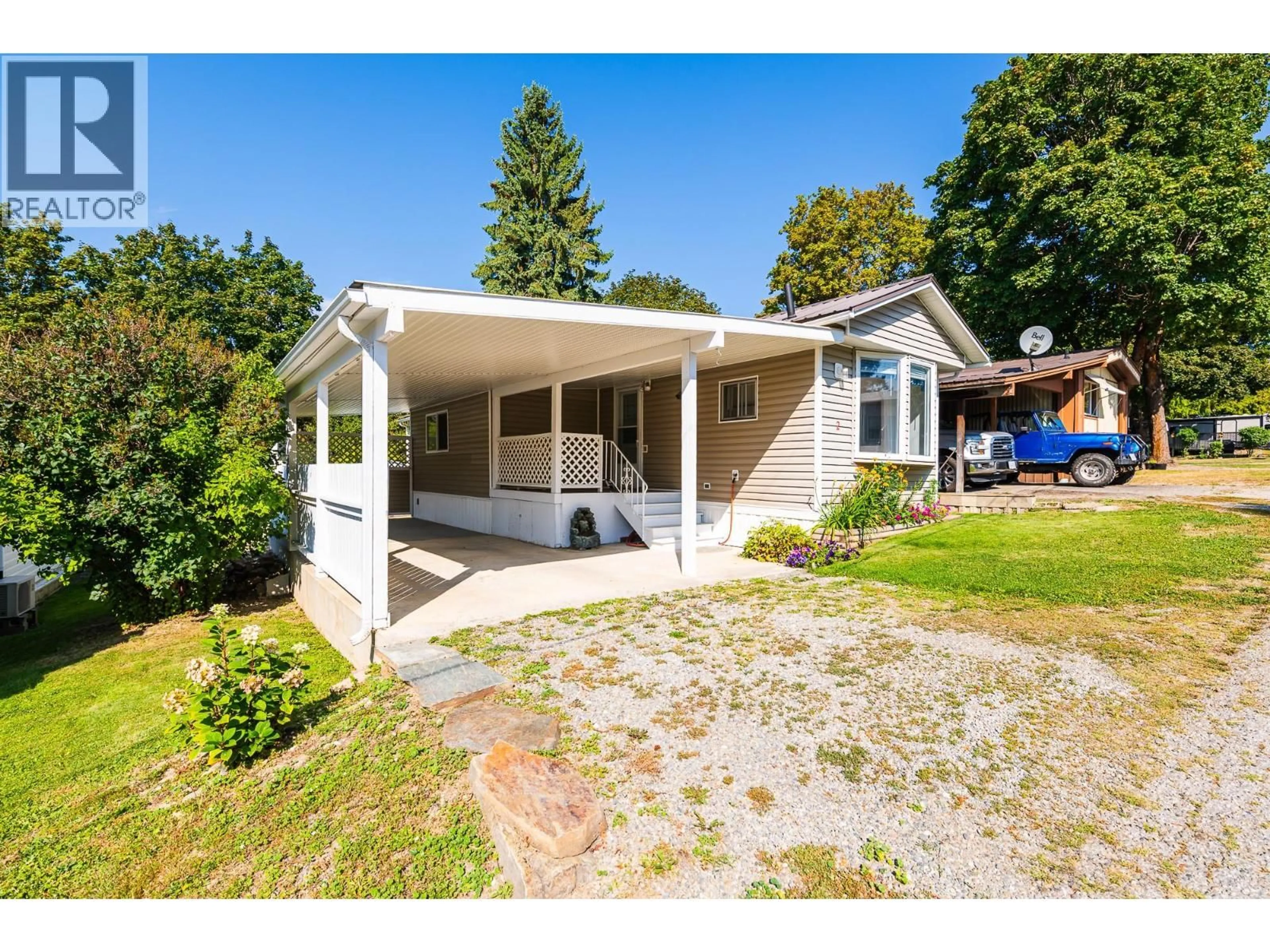 Home with vinyl exterior material, street for 2 - 1421 ERICKSON ROAD, Creston British Columbia V0B1G1
