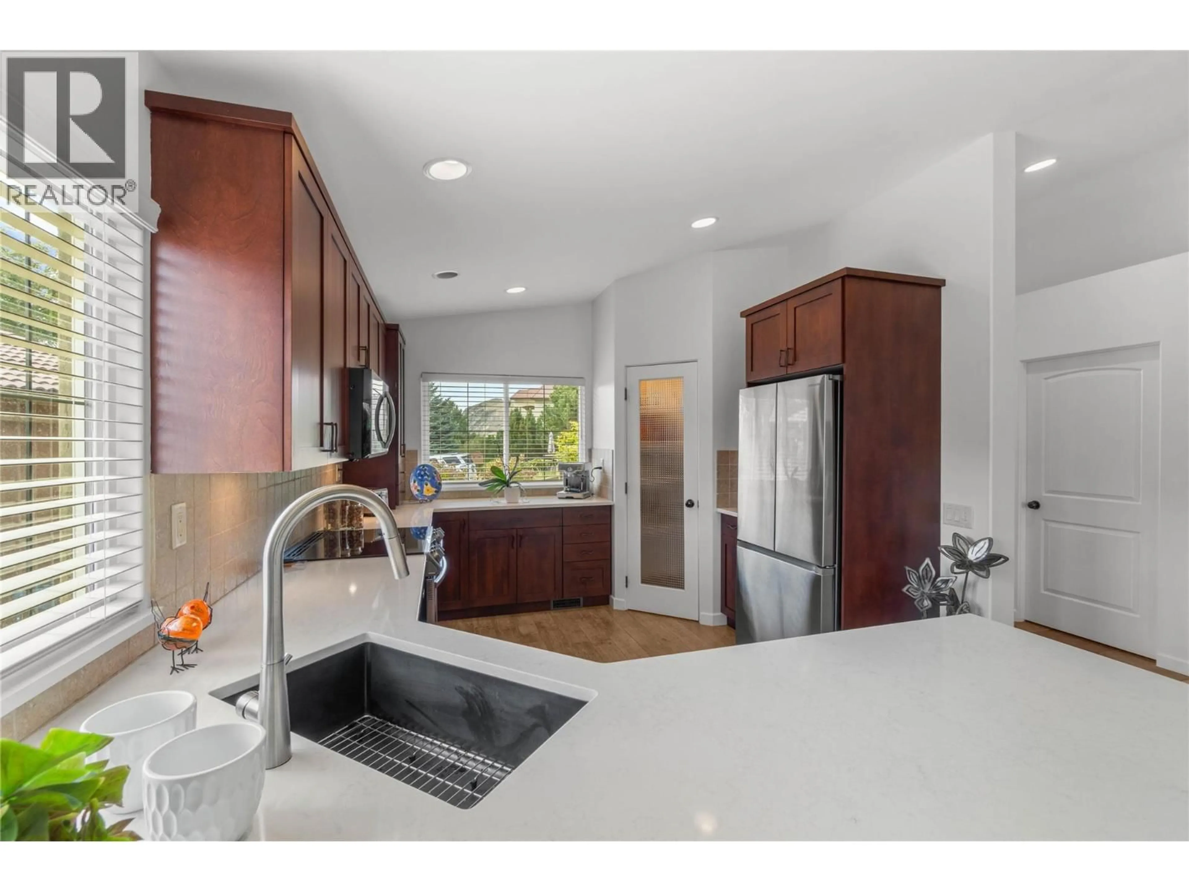 Open concept kitchen, ceramic/tile floor for 728 ROSEWOOD CRESCENT, Kamloops British Columbia V2H1S3