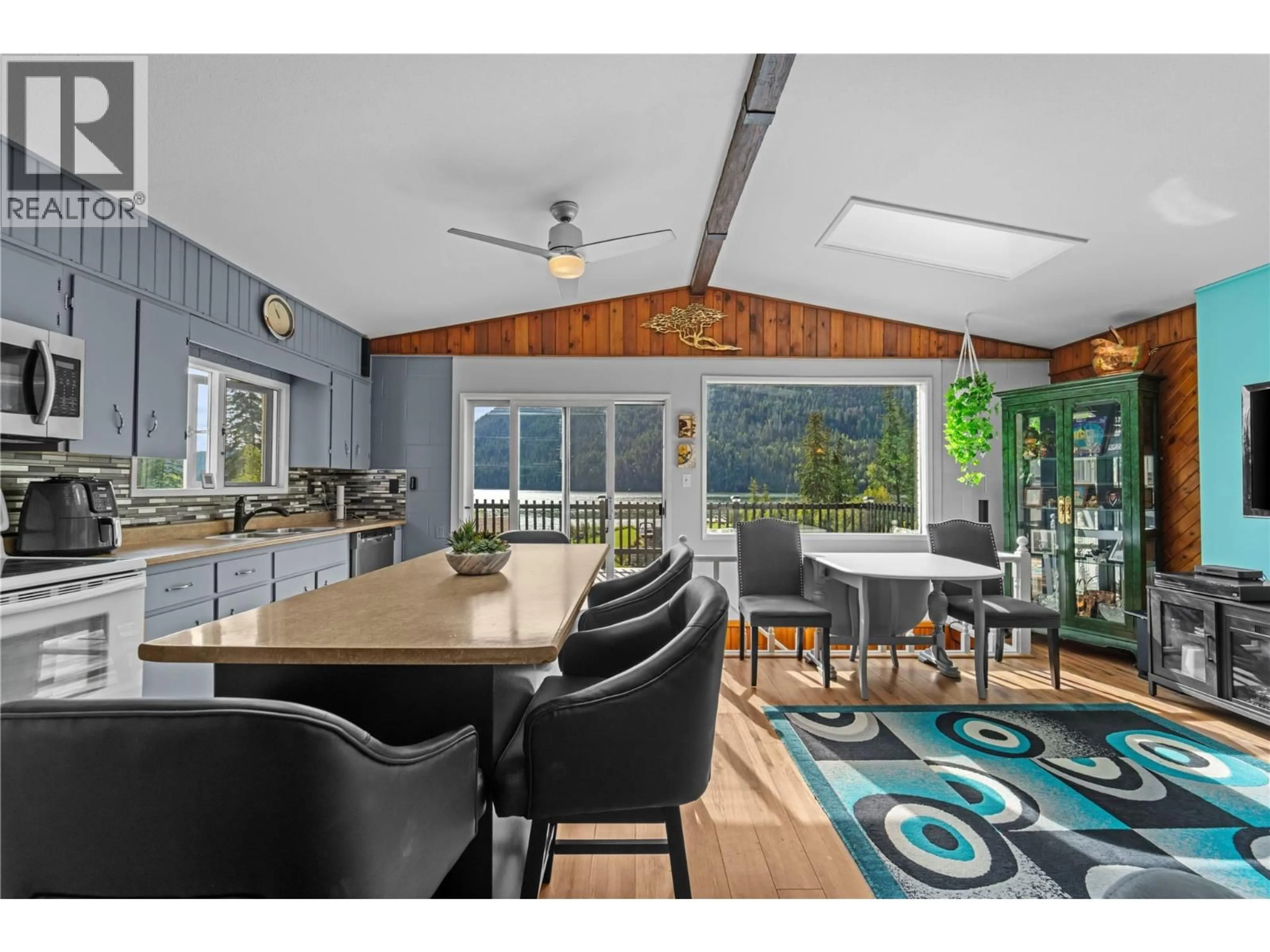 Open concept kitchen, wood/laminate floor for 2348 OJIBWAY ROAD, Kamloops British Columbia V2H1P1