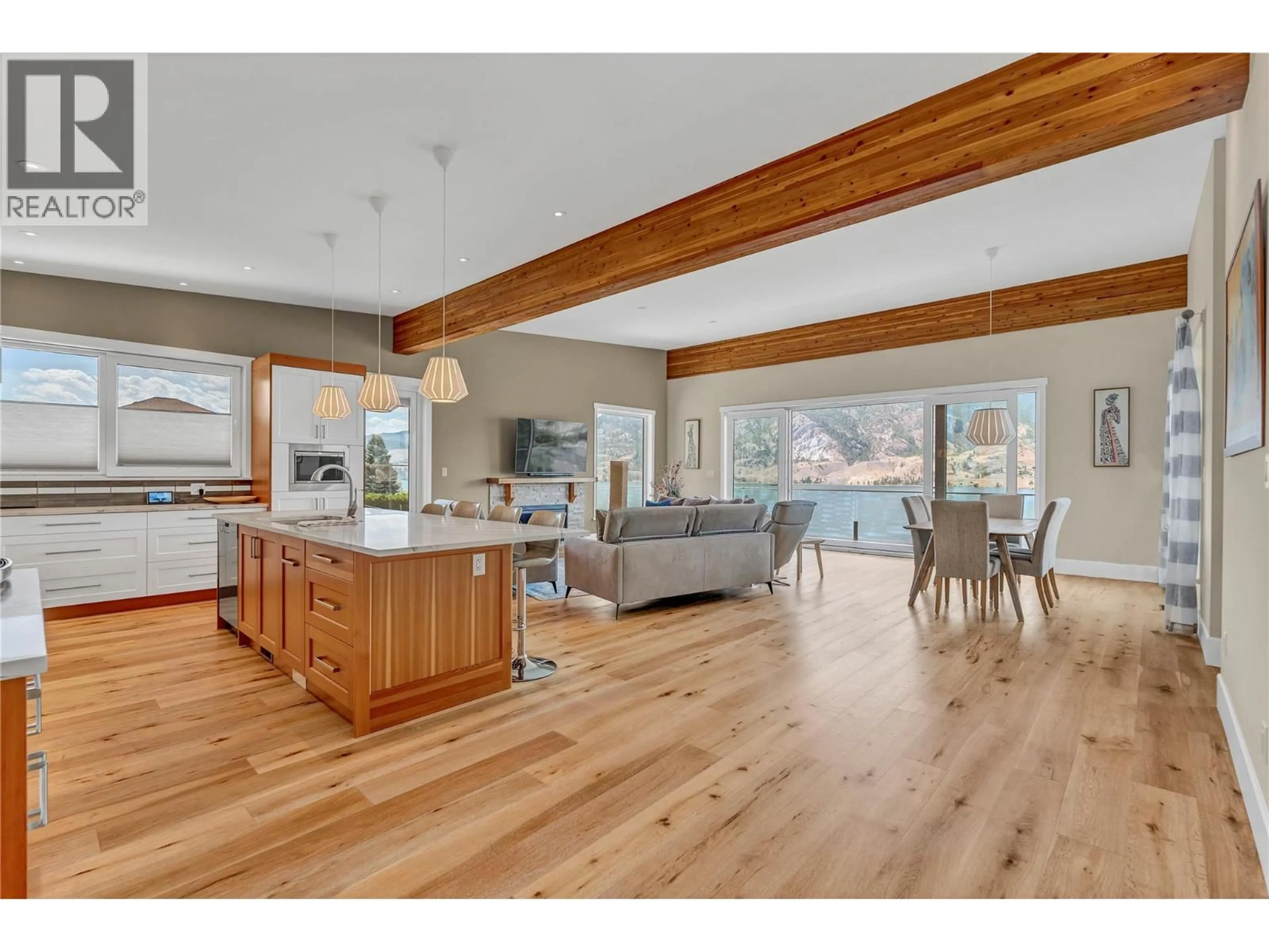 Open concept kitchen, wood/laminate floor for 3984 FINNERTY ROAD, Penticton British Columbia V2A8W2