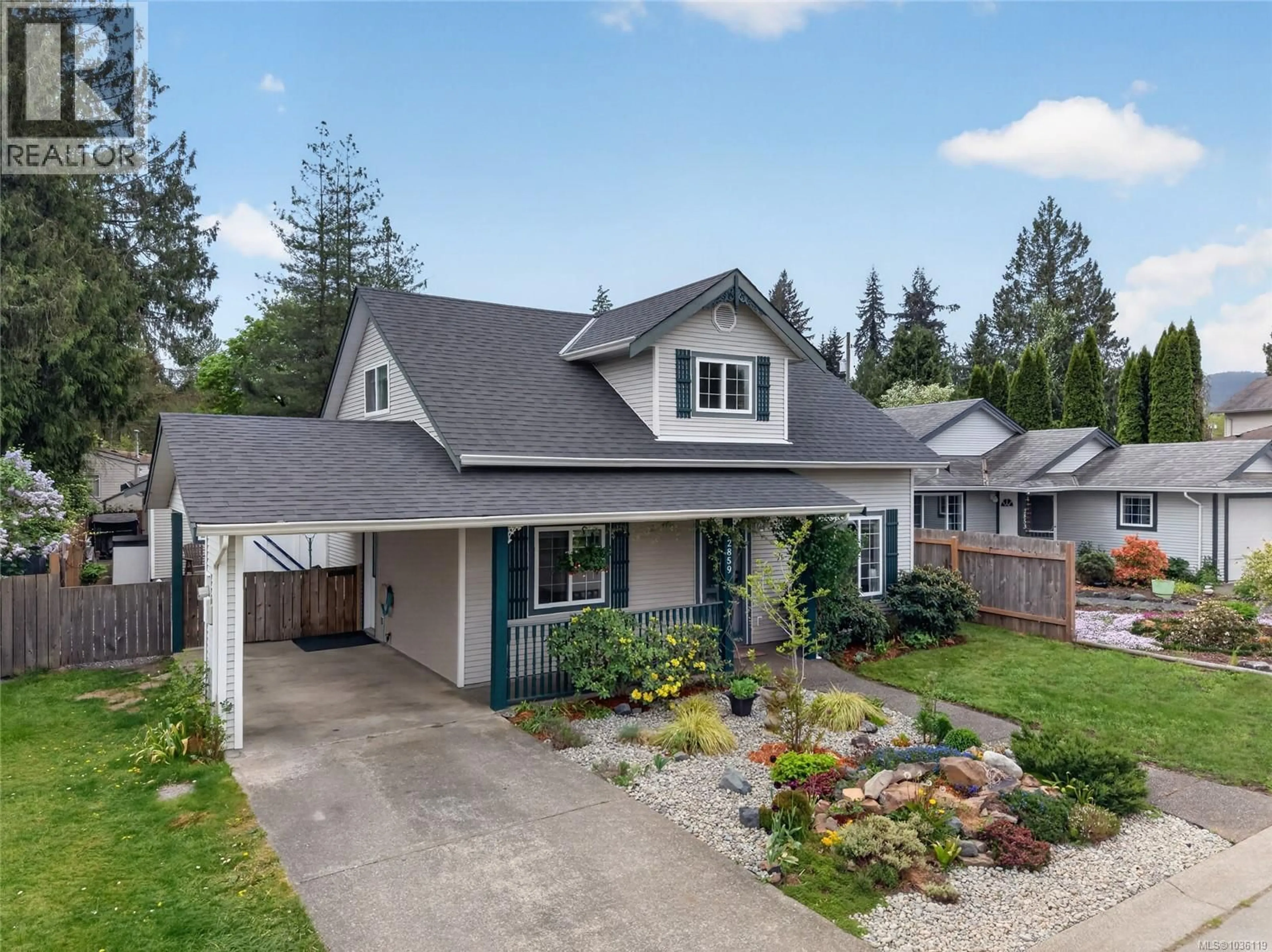 A pic from outside/outdoor area/front of a property/back of a property/a pic from drone, street for 2859 PENRITH AVENUE, Cumberland British Columbia V0R1S0