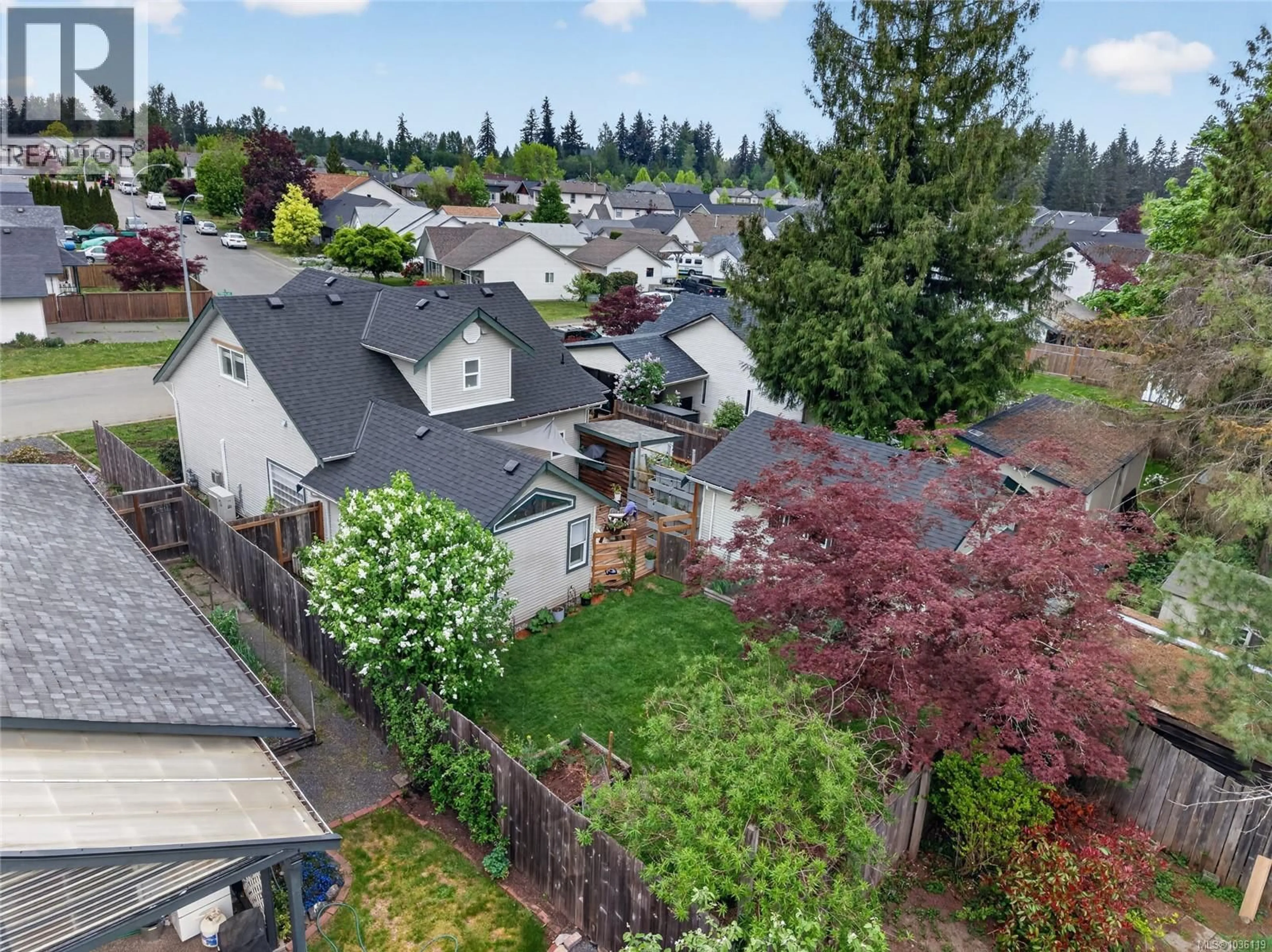 A pic from outside/outdoor area/front of a property/back of a property/a pic from drone, street for 2859 PENRITH AVENUE, Cumberland British Columbia V0R1S0