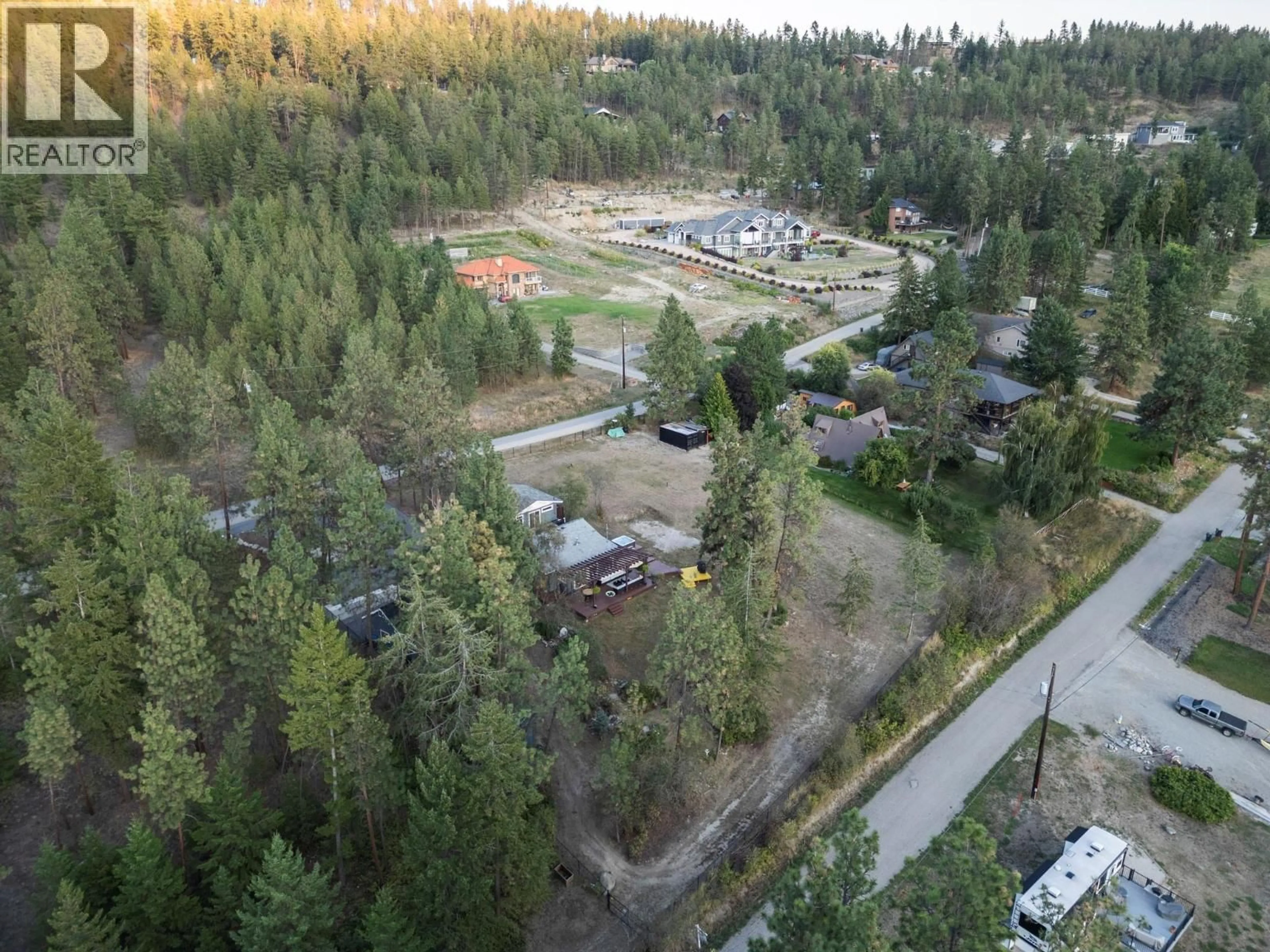 A pic from outside/outdoor area/front of a property/back of a property/a pic from drone, forest/trees view for 5555 STUBBS ROAD, Lake Country British Columbia V4V1N1