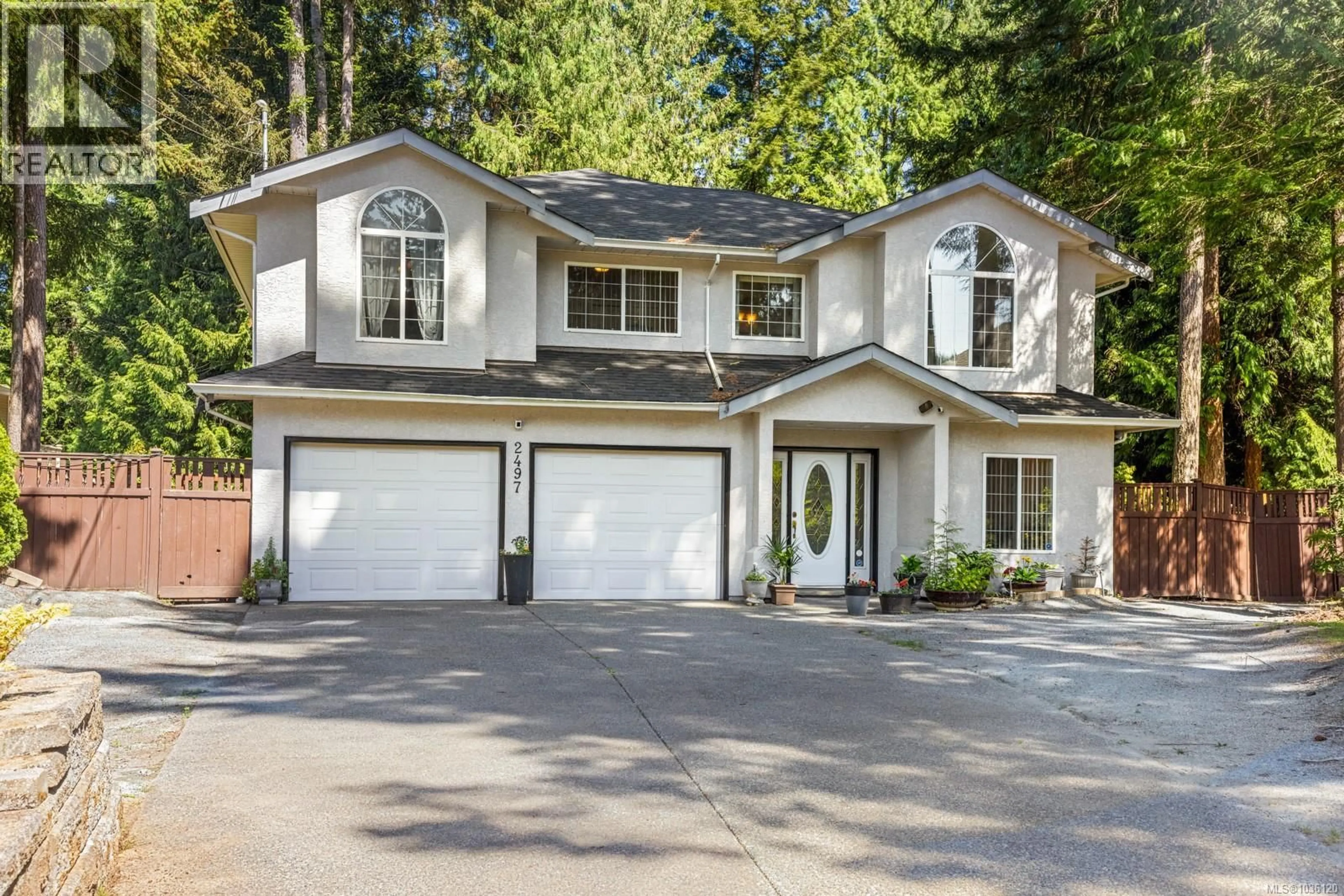 Home with vinyl exterior material, street for 2497 CAYMAN PLACE, Mill Bay British Columbia V0R2P1