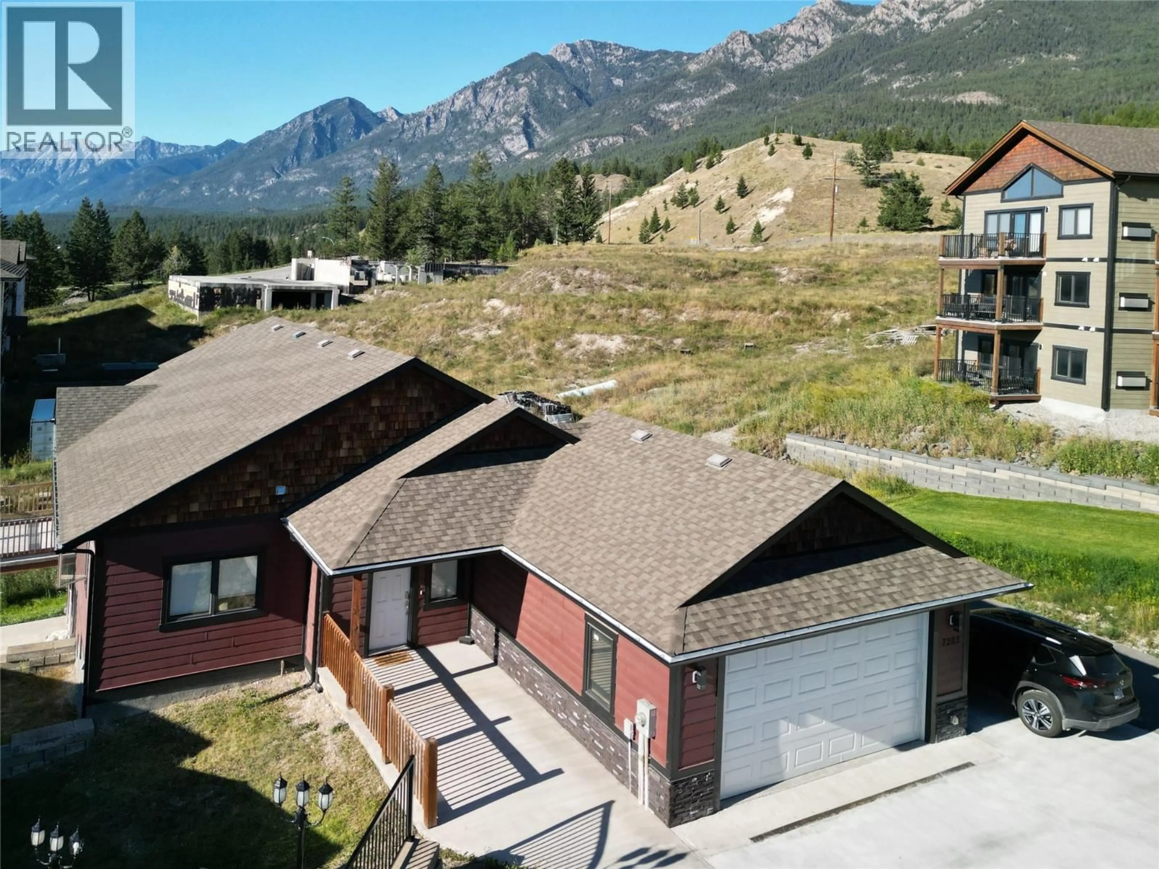 A pic from outside/outdoor area/front of a property/back of a property/a pic from drone, mountain view for 7283 COPPERHORN DRIVE, Radium Hot Springs British Columbia V0A1M0