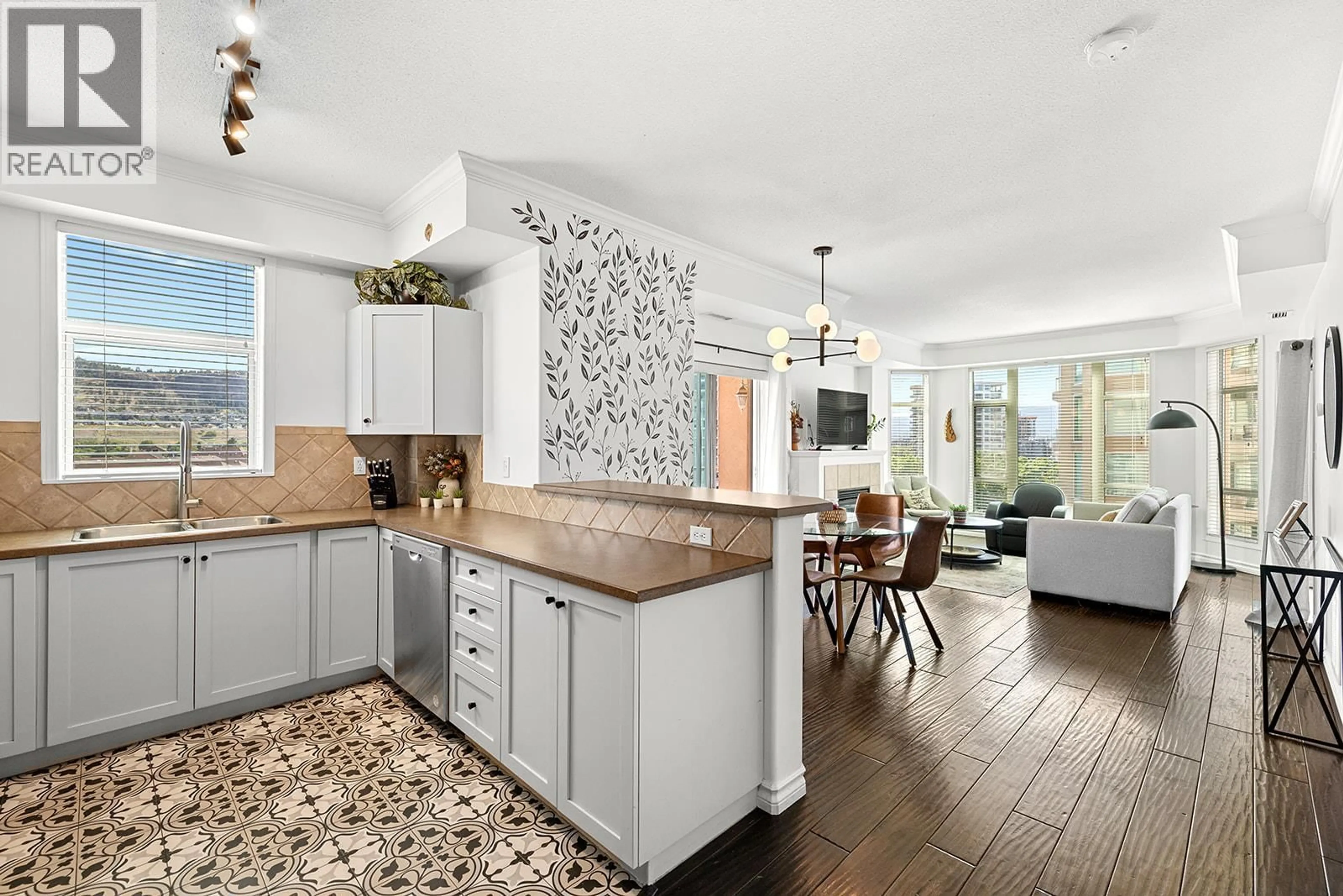 Open concept kitchen, ceramic/tile floor for 703 - 1128 SUNSET DRIVE, Kelowna British Columbia V1Y9W7