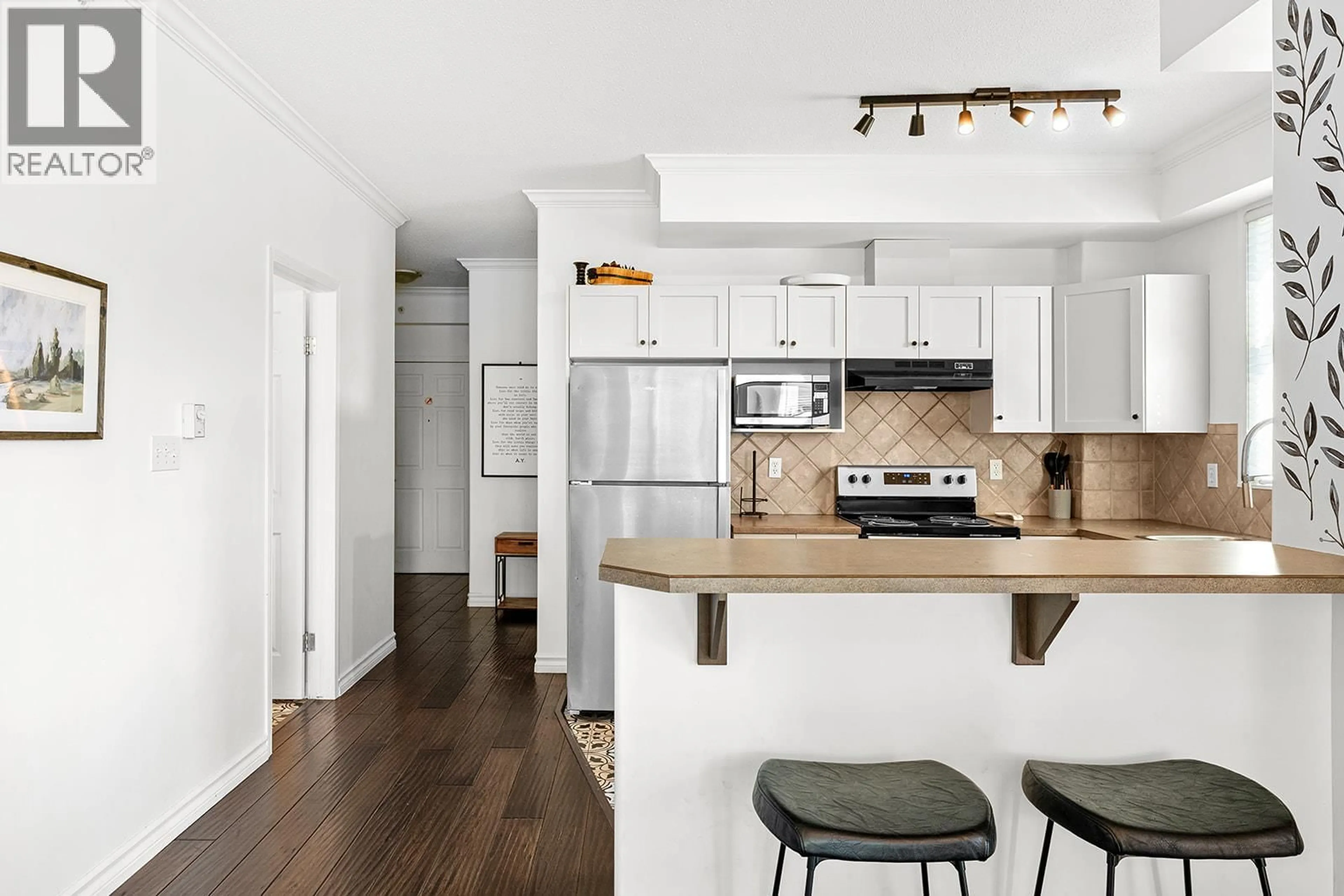 Open concept kitchen, unknown for 703 - 1128 SUNSET DRIVE, Kelowna British Columbia V1Y9W7