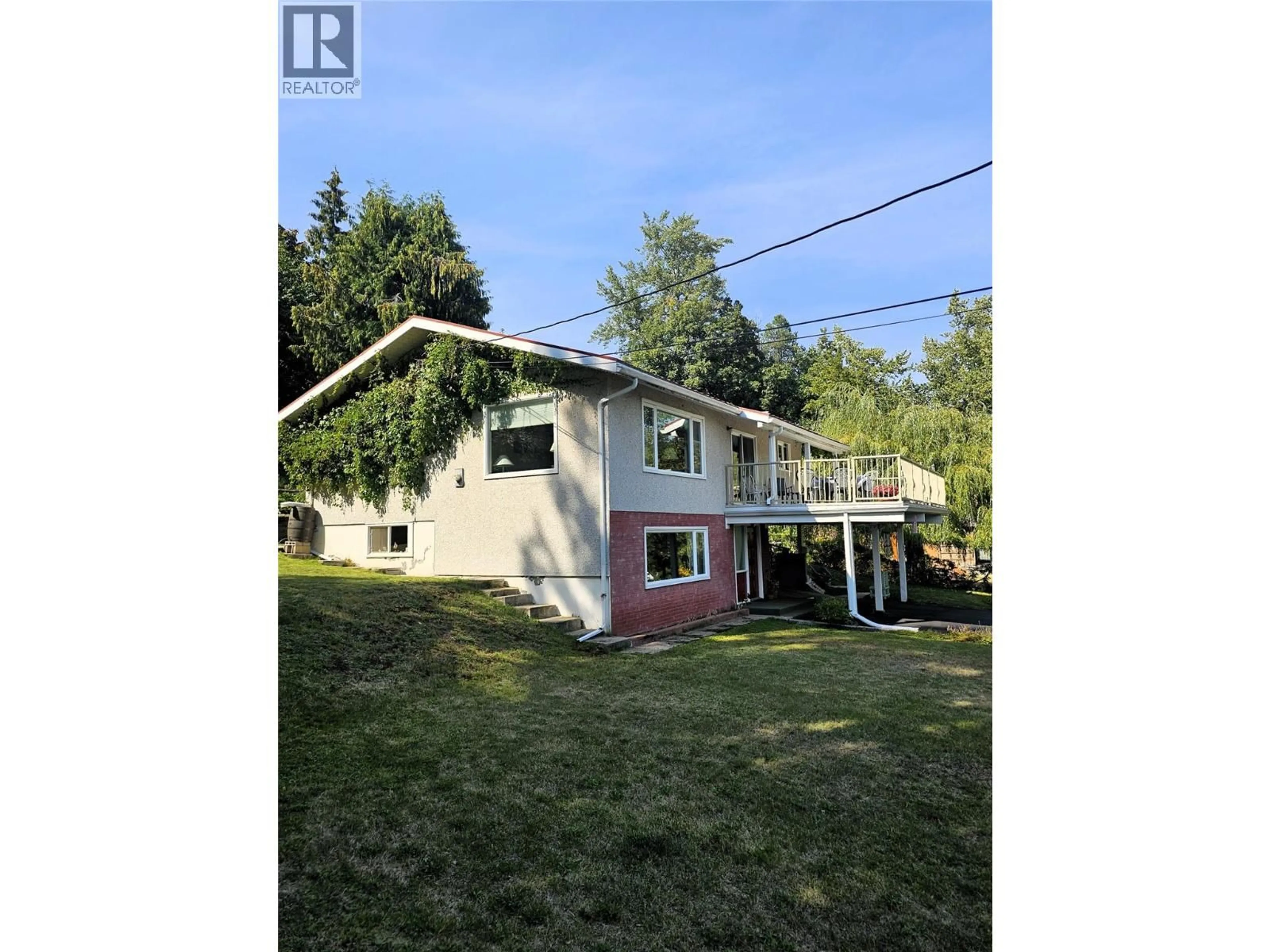 A pic from outside/outdoor area/front of a property/back of a property/a pic from drone, water/lake/river/ocean view for 1301 WASHINGTON STREET, Rossland British Columbia V0G1Y0
