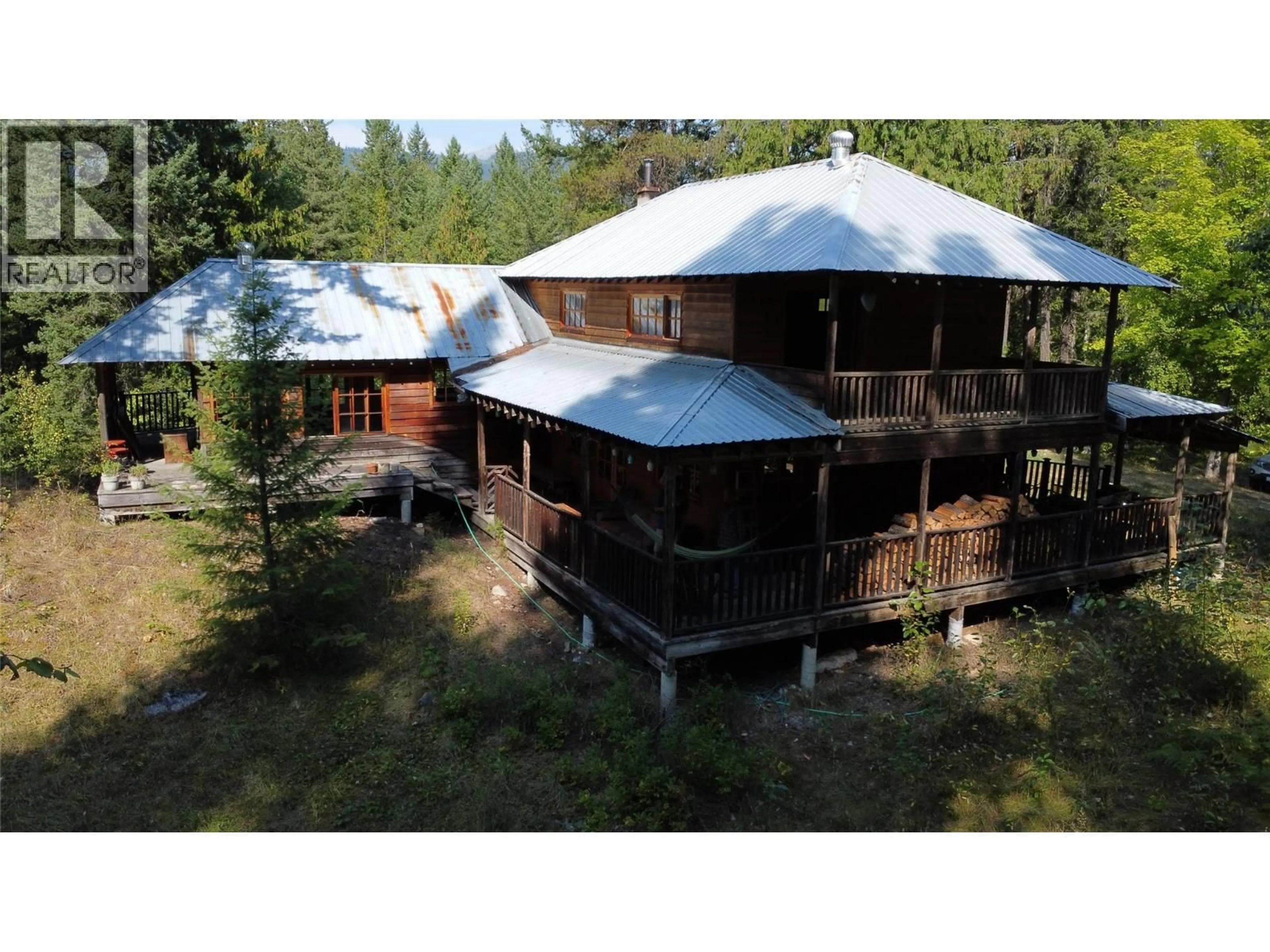 A pic from outside/outdoor area/front of a property/back of a property/a pic from drone, building for 7467 ST THOMAS ROAD, Winlaw British Columbia V0G2J0