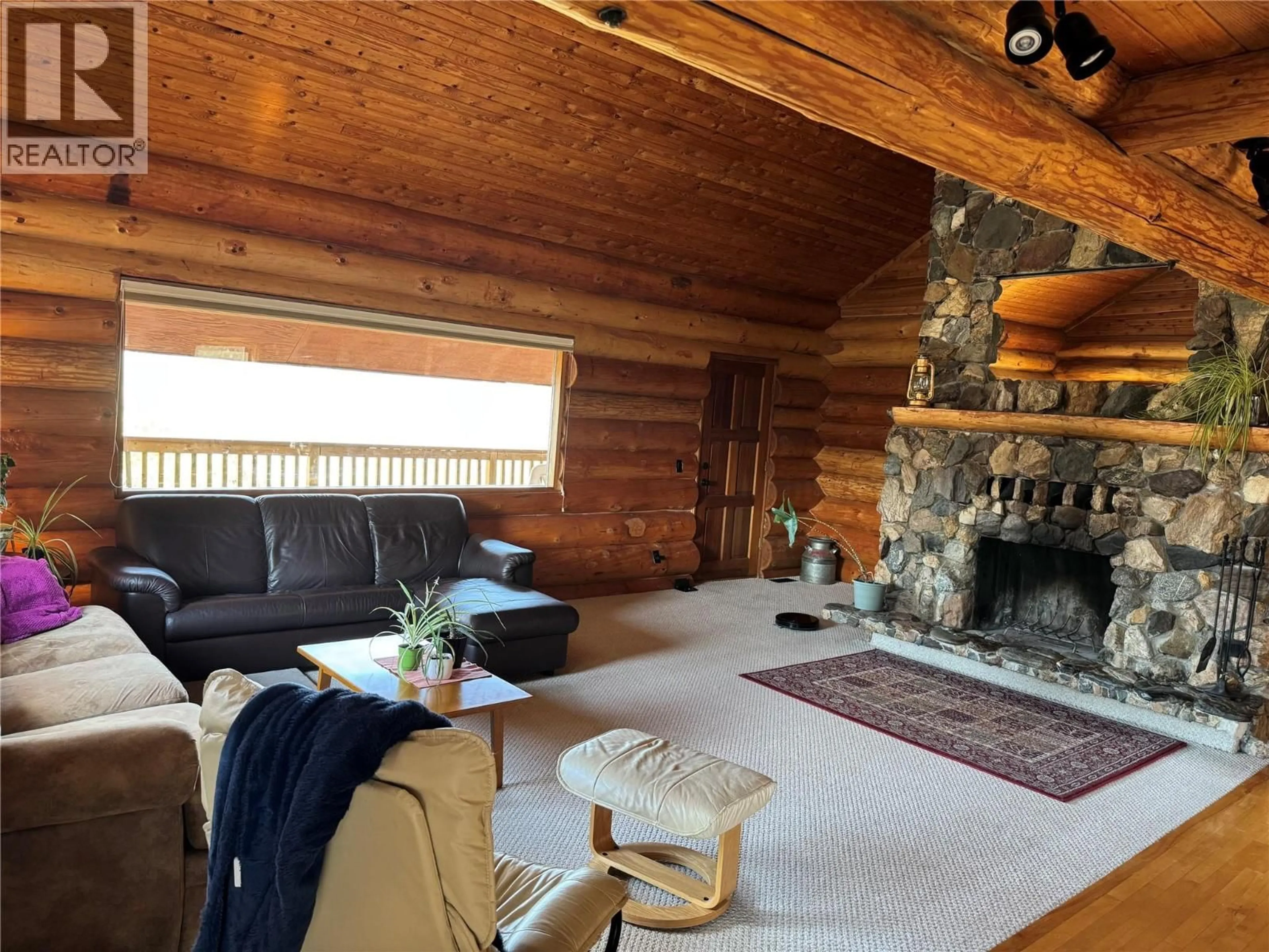 Living room with furniture, wood/laminate floor for 1135 CLEARVIEW DRIVE, Kamloops British Columbia V2C5E6