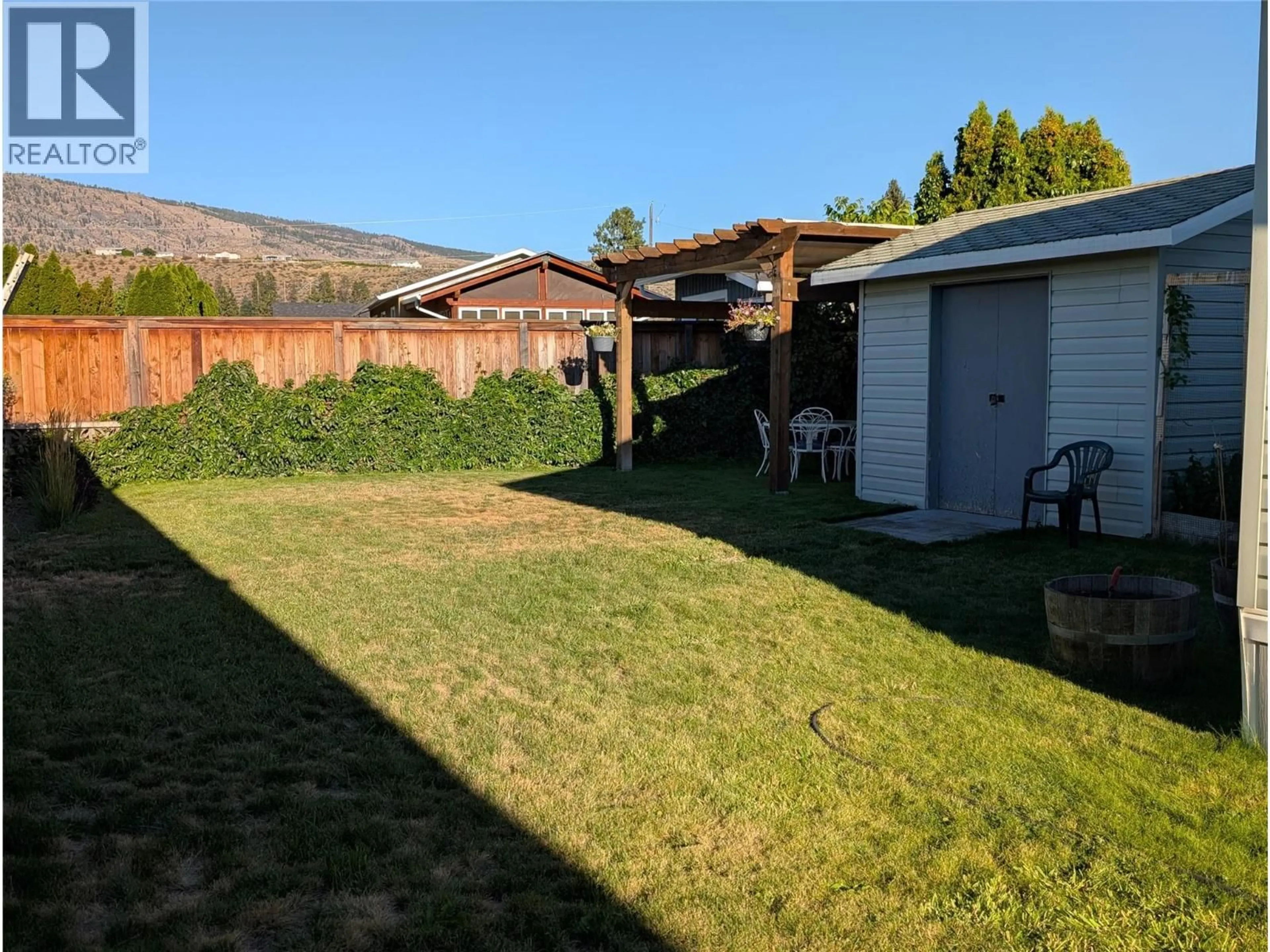 A pic from outside/outdoor area/front of a property/back of a property/a pic from drone, mountain view for 5 - 6778 TUCELNUIT DRIVE, Oliver British Columbia V0H1T3