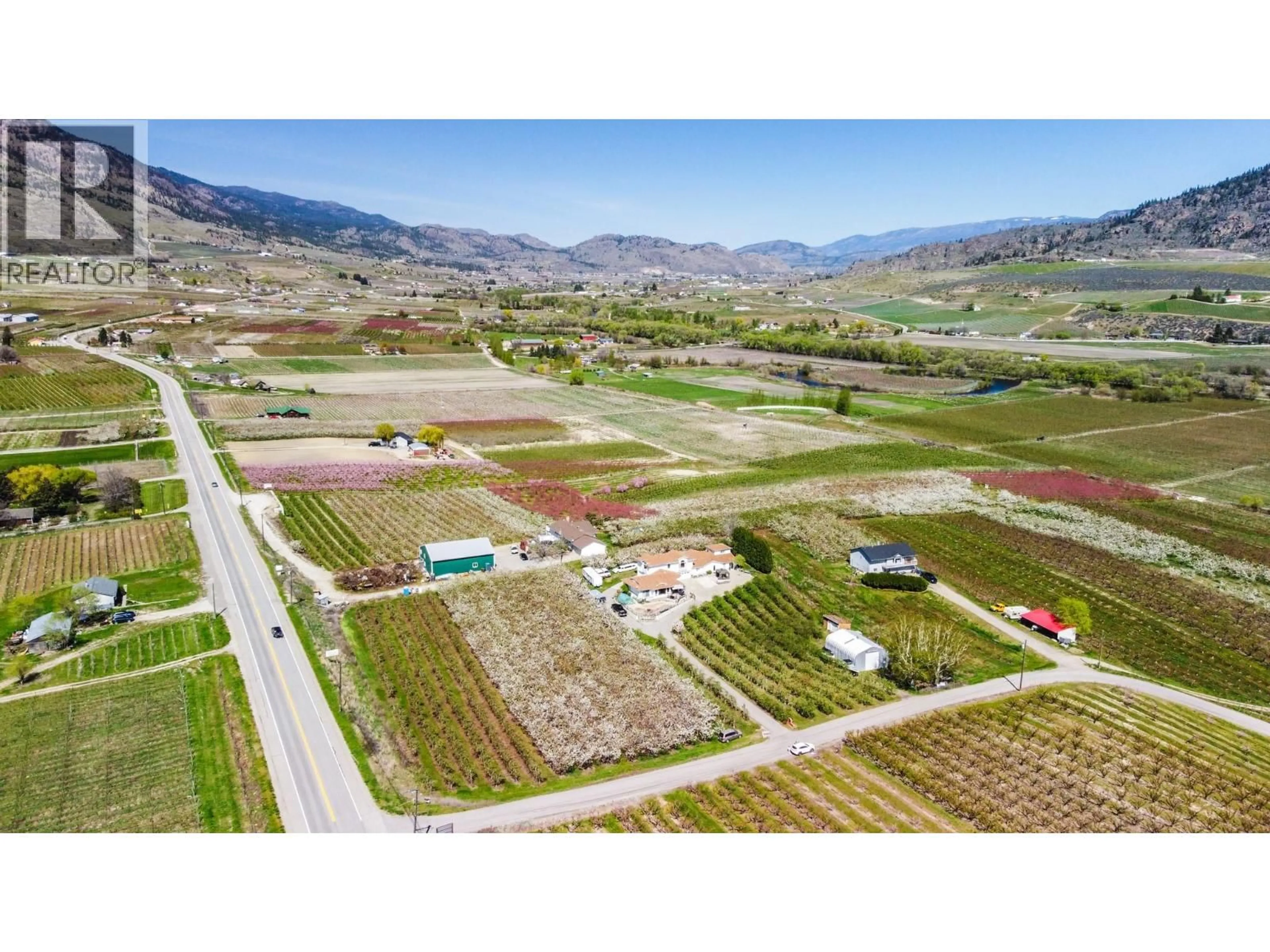 A pic from outside/outdoor area/front of a property/back of a property/a pic from drone, mountain view for 384 19 ROAD, Oliver British Columbia V0H1T1