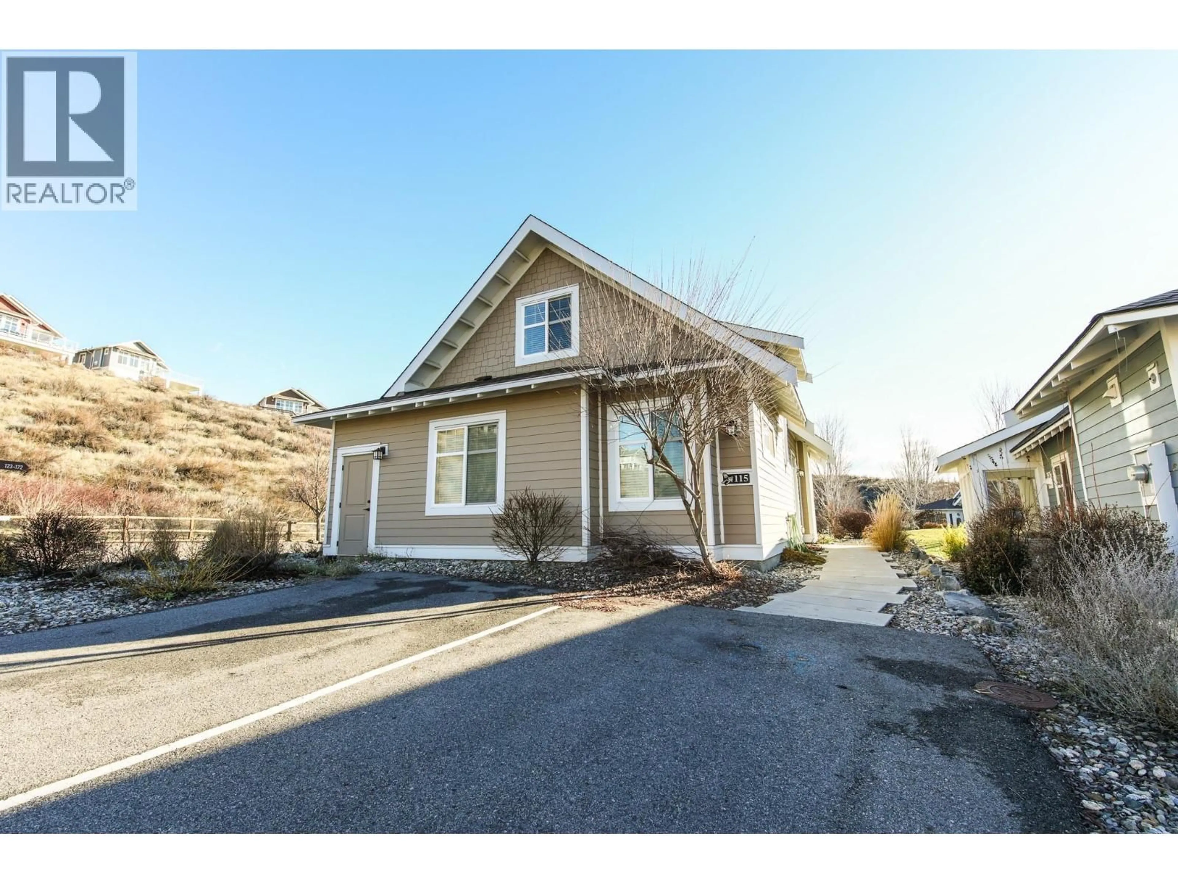 Home with vinyl exterior material, street for 115 - 2450 RADIO TOWER ROAD, Oliver British Columbia V0H1T1