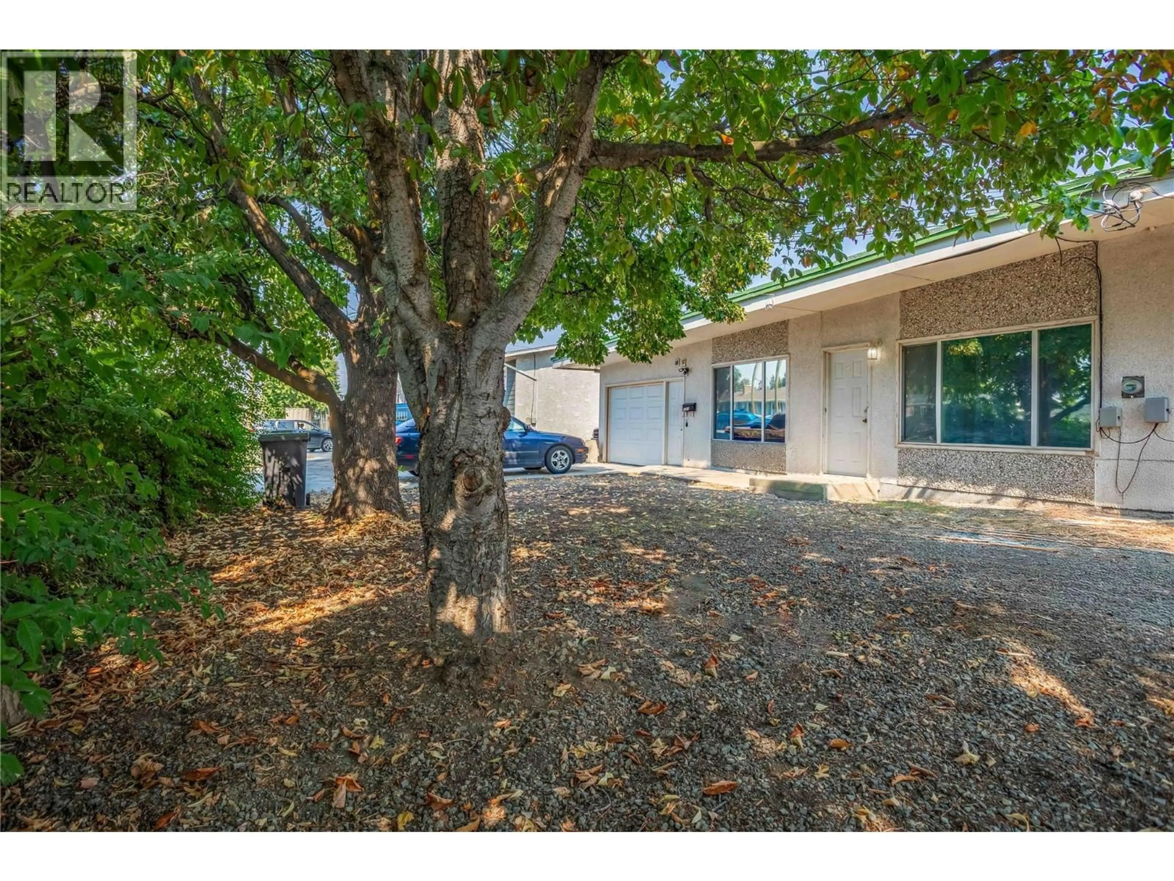 A pic from outside/outdoor area/front of a property/back of a property/a pic from drone, unknown for 715A GERSTMAR ROAD, Kelowna British Columbia V1X4B4
