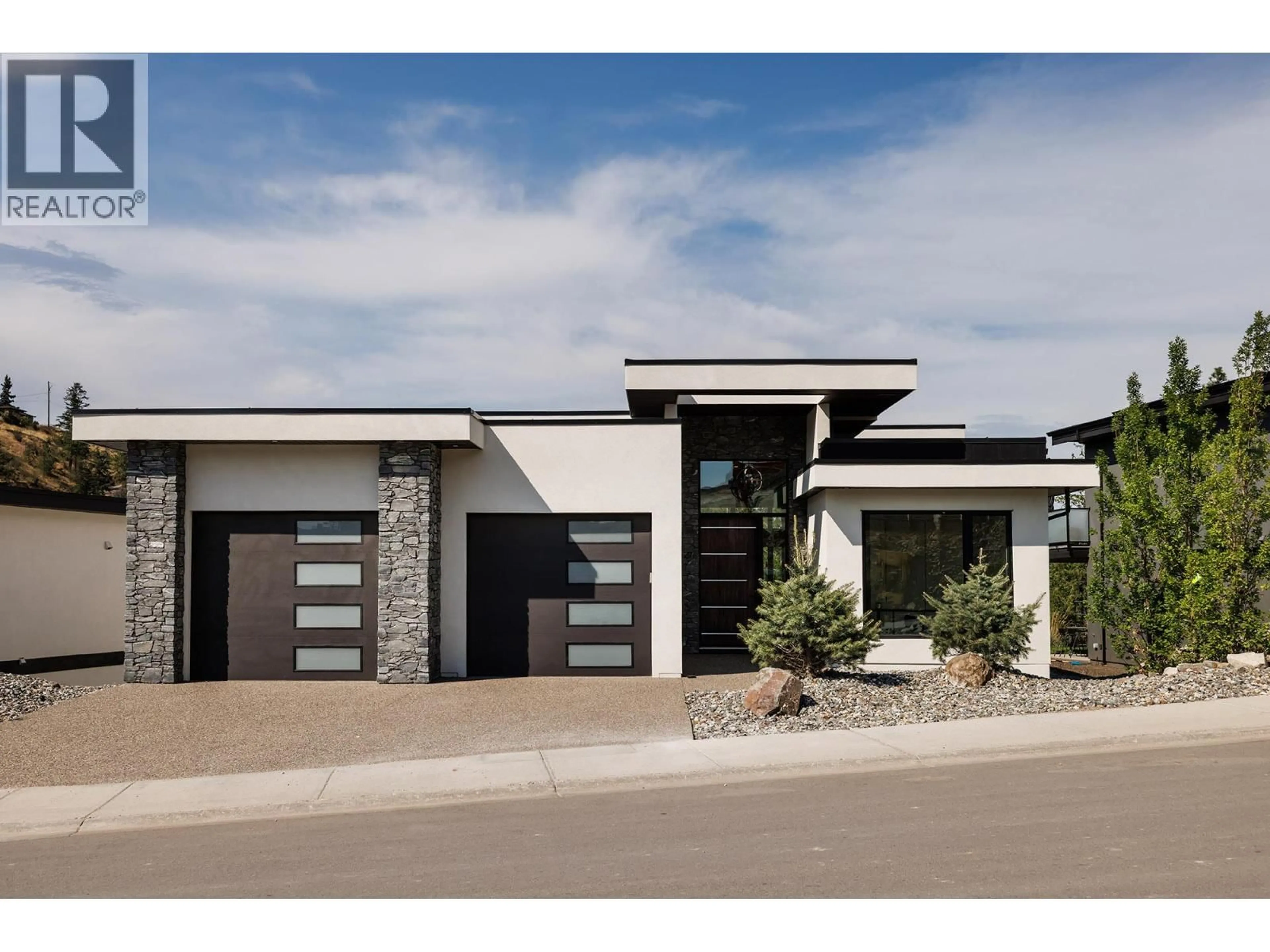 Home with brick exterior material, street for 10274 BEACON HILL DRIVE, Lake Country British Columbia V4V0A9