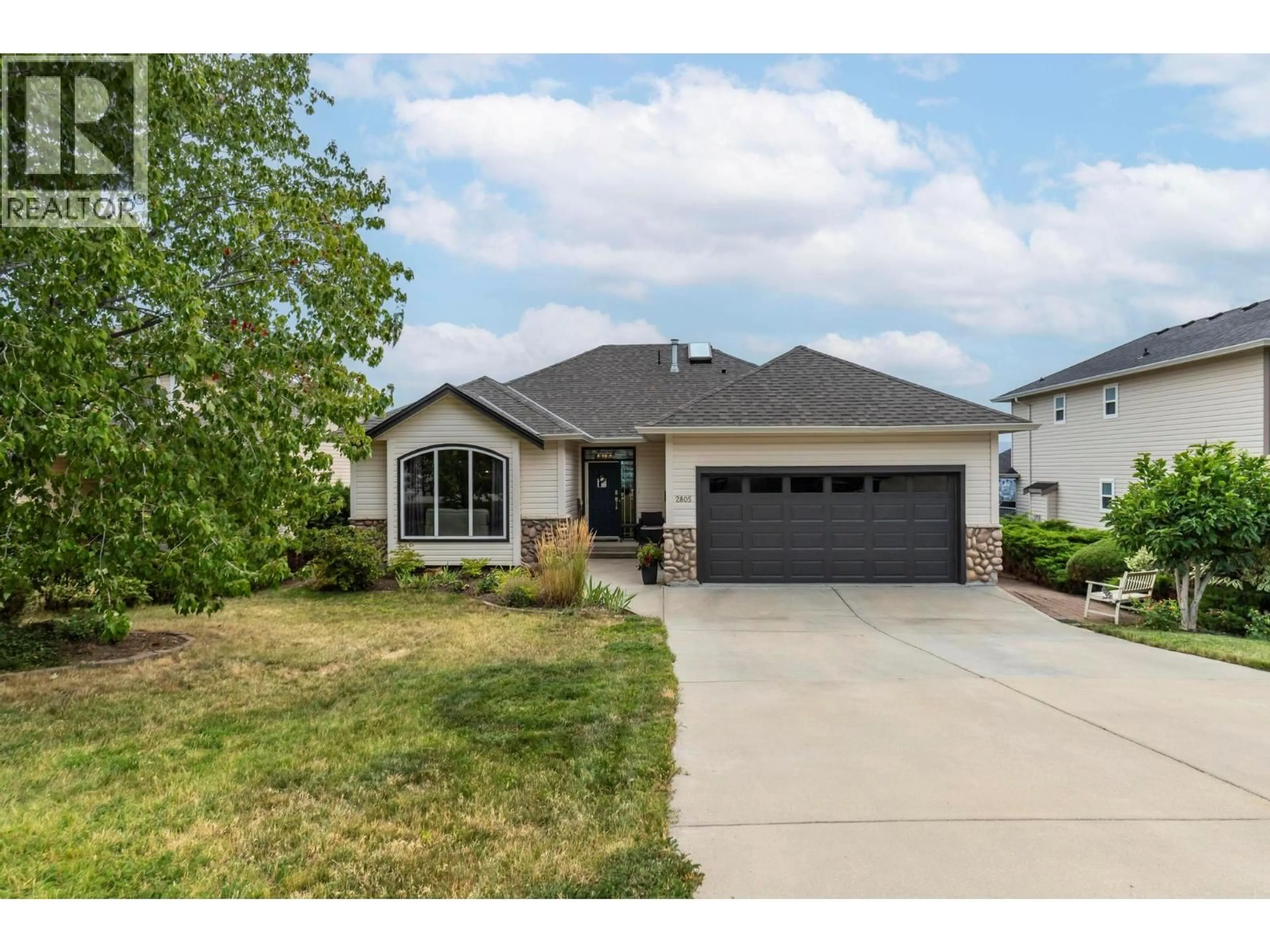 Home with vinyl exterior material, street for 2805 DOUCETTE DRIVE, West Kelowna British Columbia V4T2S6