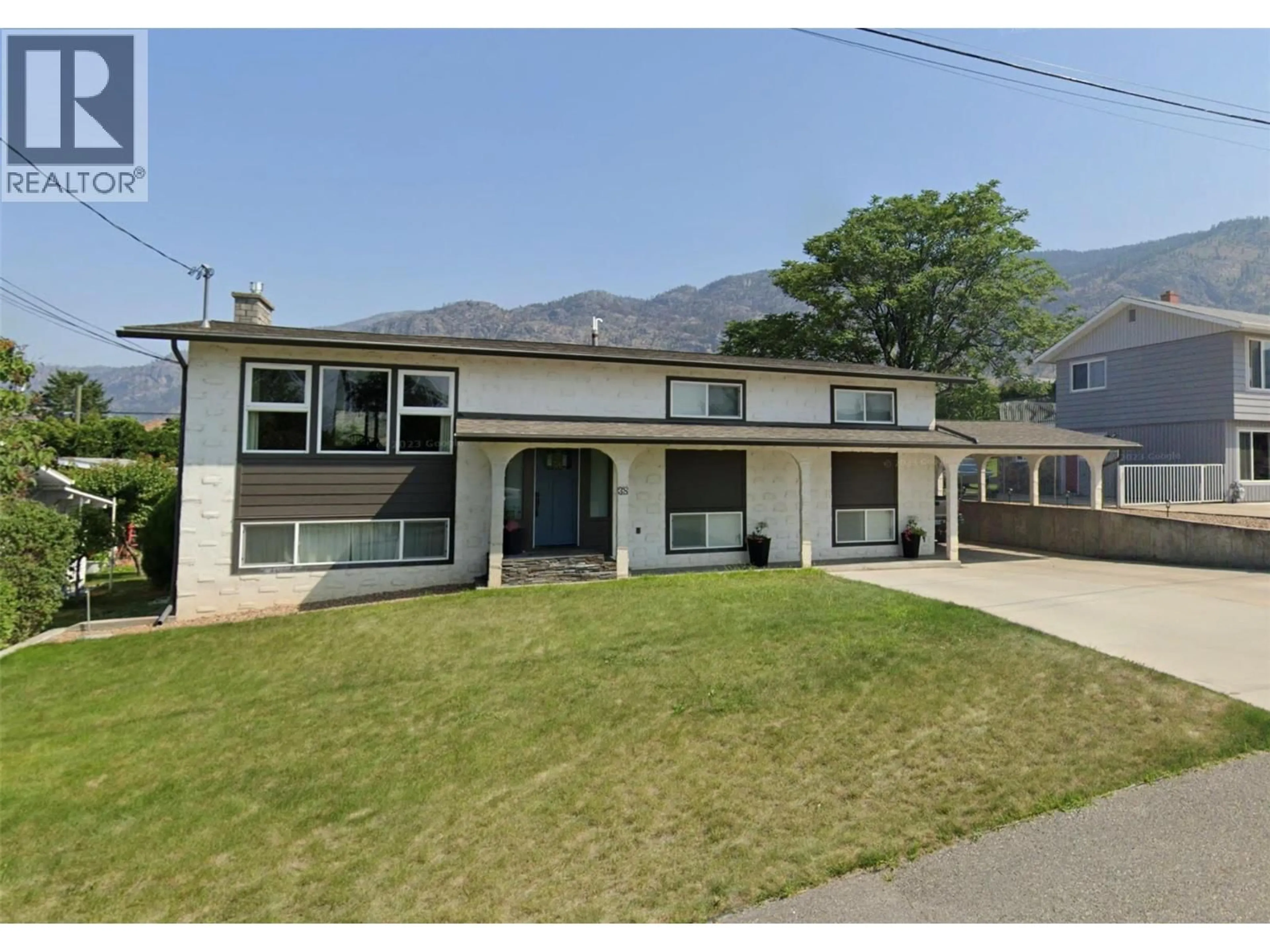 Home with vinyl exterior material, street for 38 WILLOW CRESCENT, Osoyoos British Columbia V0H1V3