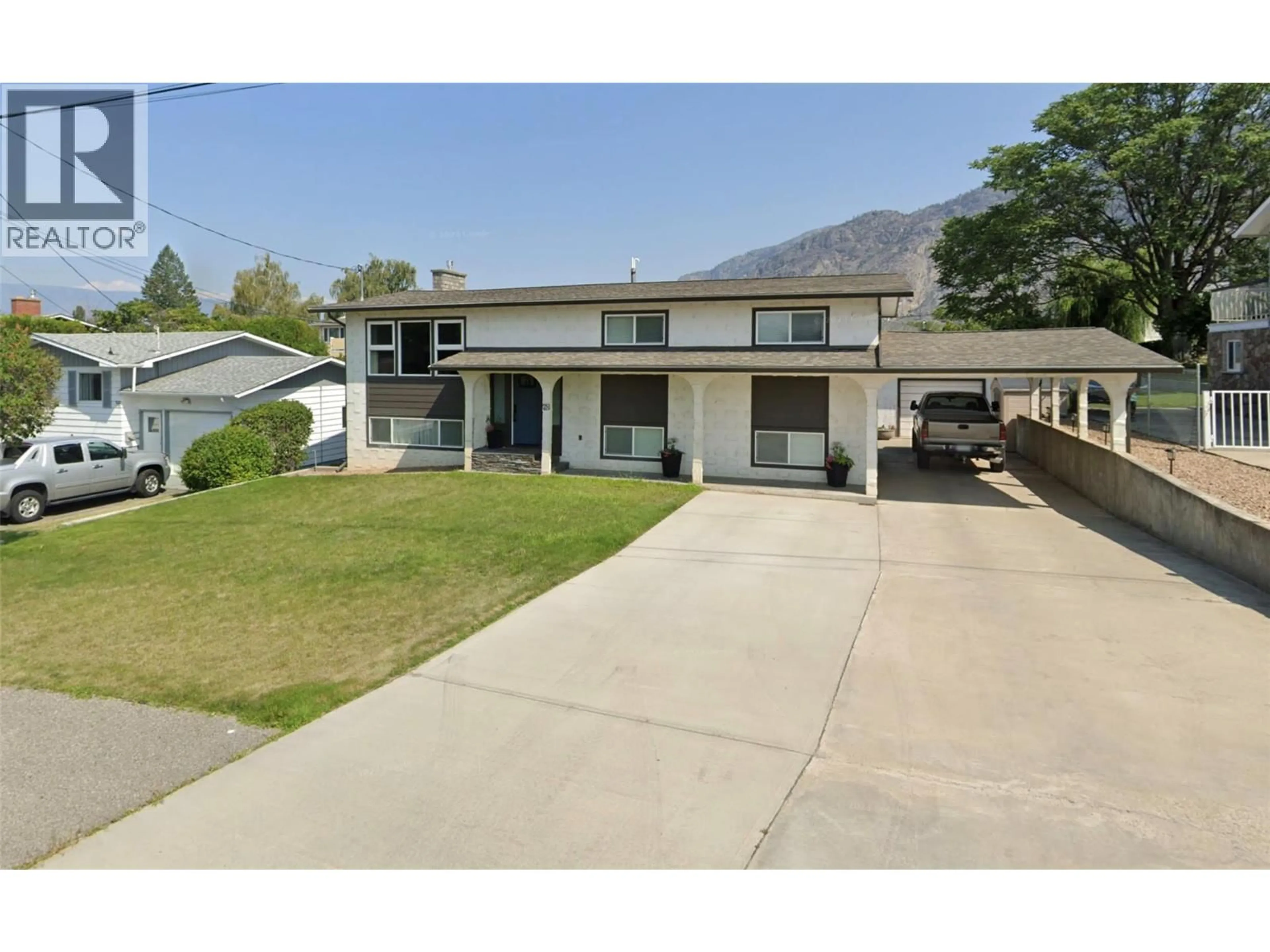 A pic from outside/outdoor area/front of a property/back of a property/a pic from drone, mountain view for 38 WILLOW CRESCENT, Osoyoos British Columbia V0H1V3