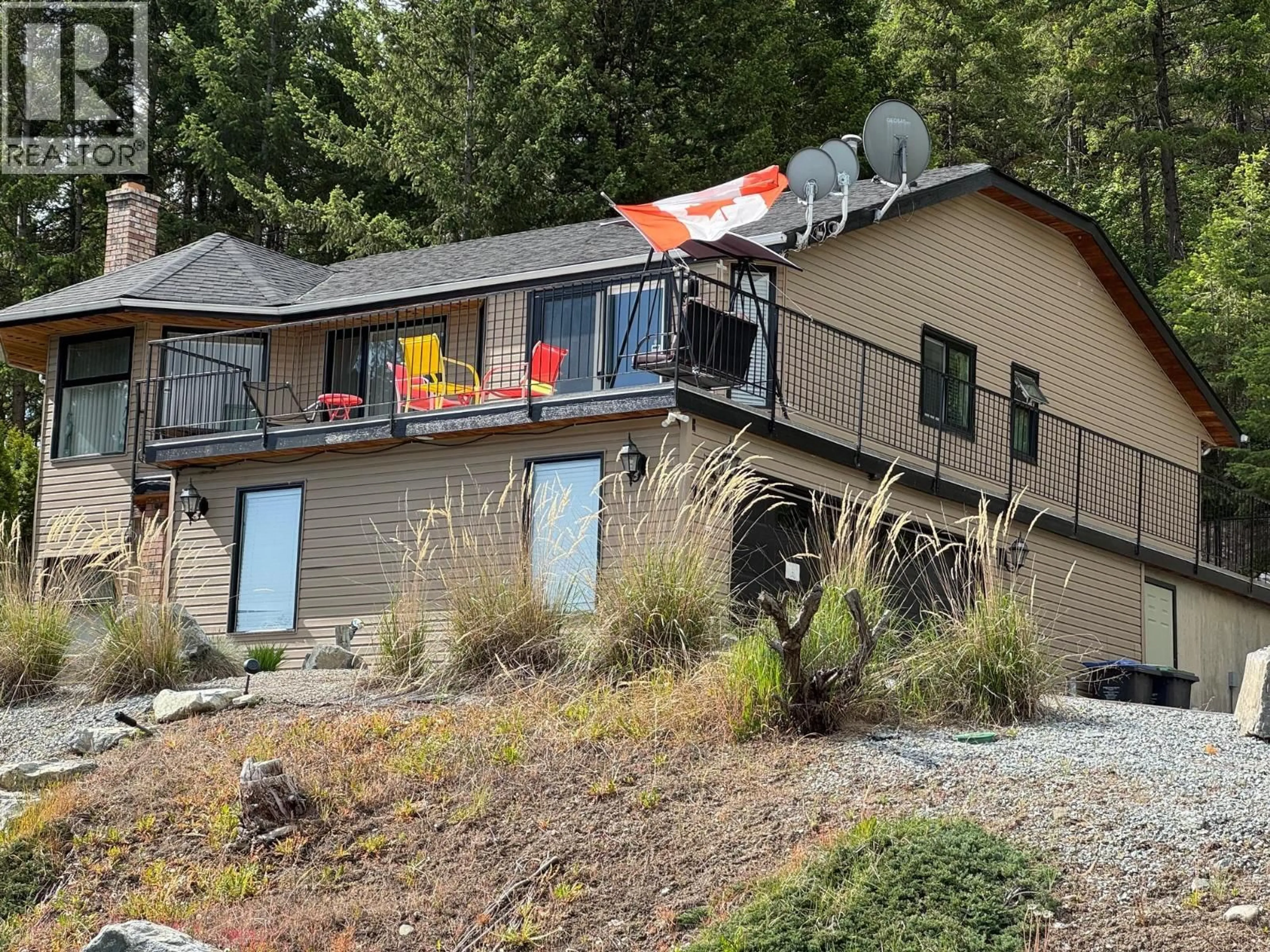 Home with vinyl exterior material, mountain view for 1820 OLYMPUS WAY, West Kelowna British Columbia V1Z3J1