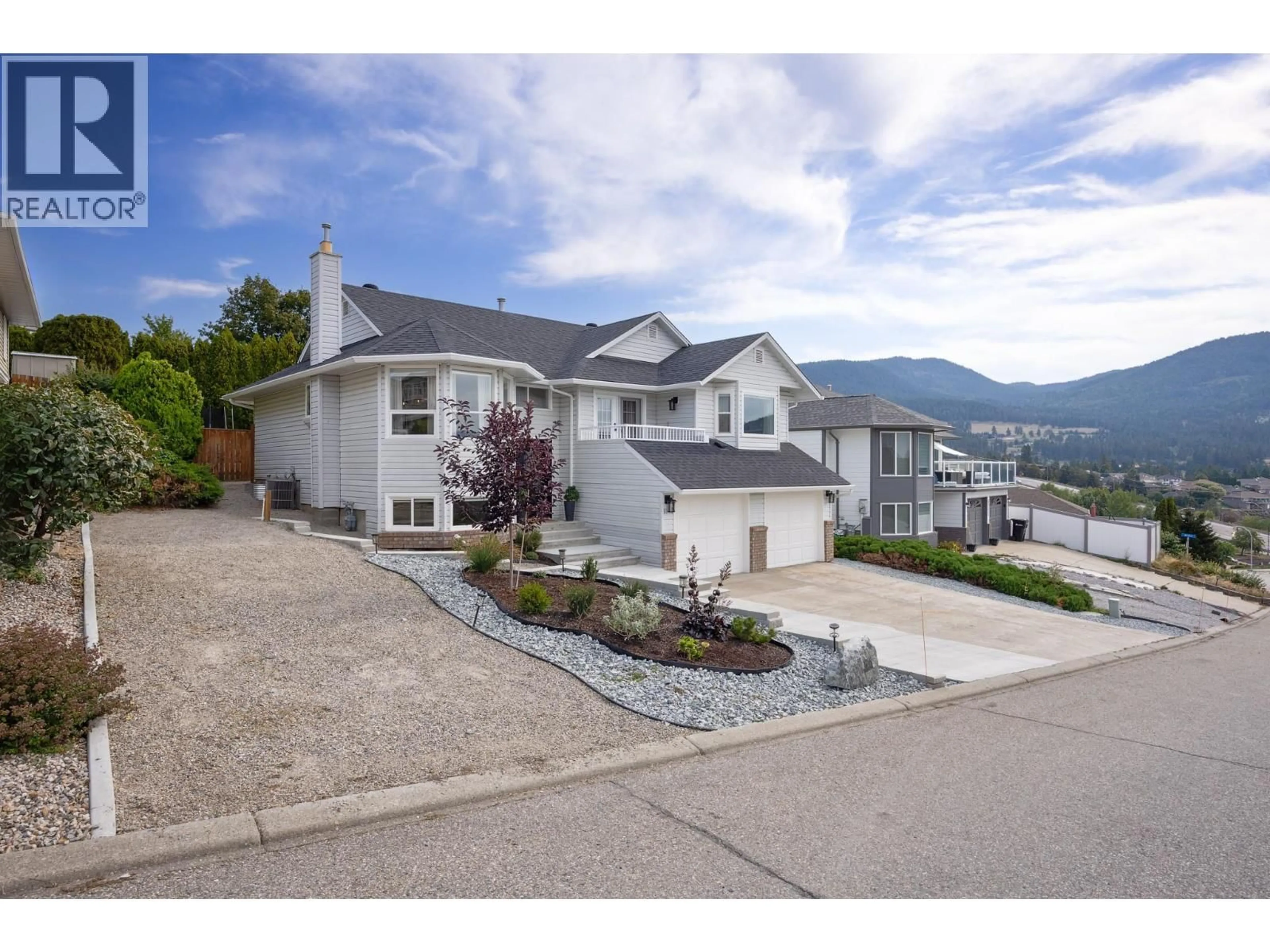 A pic from outside/outdoor area/front of a property/back of a property/a pic from drone, mountain view for 6749 FOOTHILLS DRIVE, Vernon British Columbia V1B2Y3