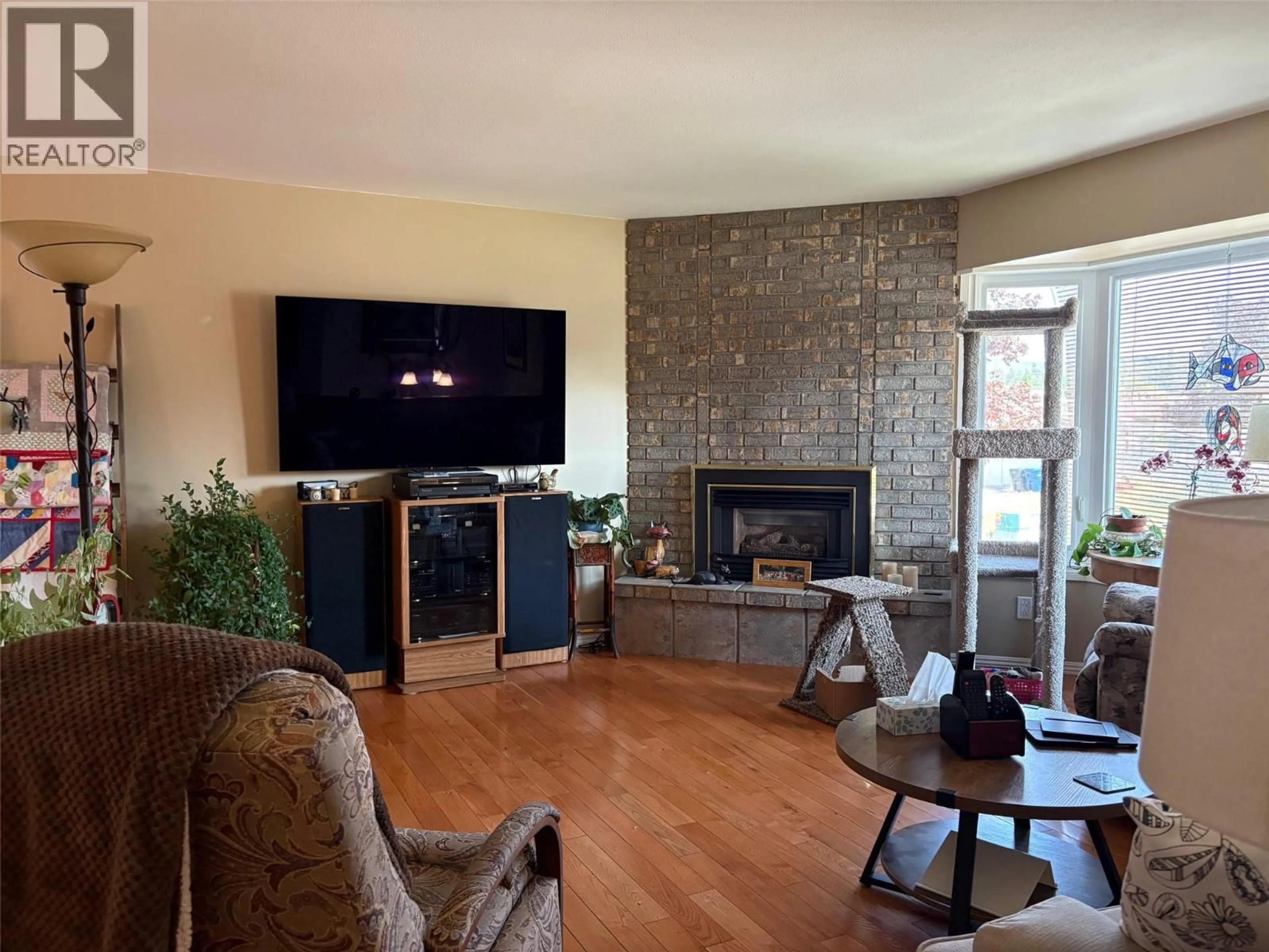 Living room with furniture, wood/laminate floor for 2220 3A STREET SOUTH, Cranbrook British Columbia V1C5K6