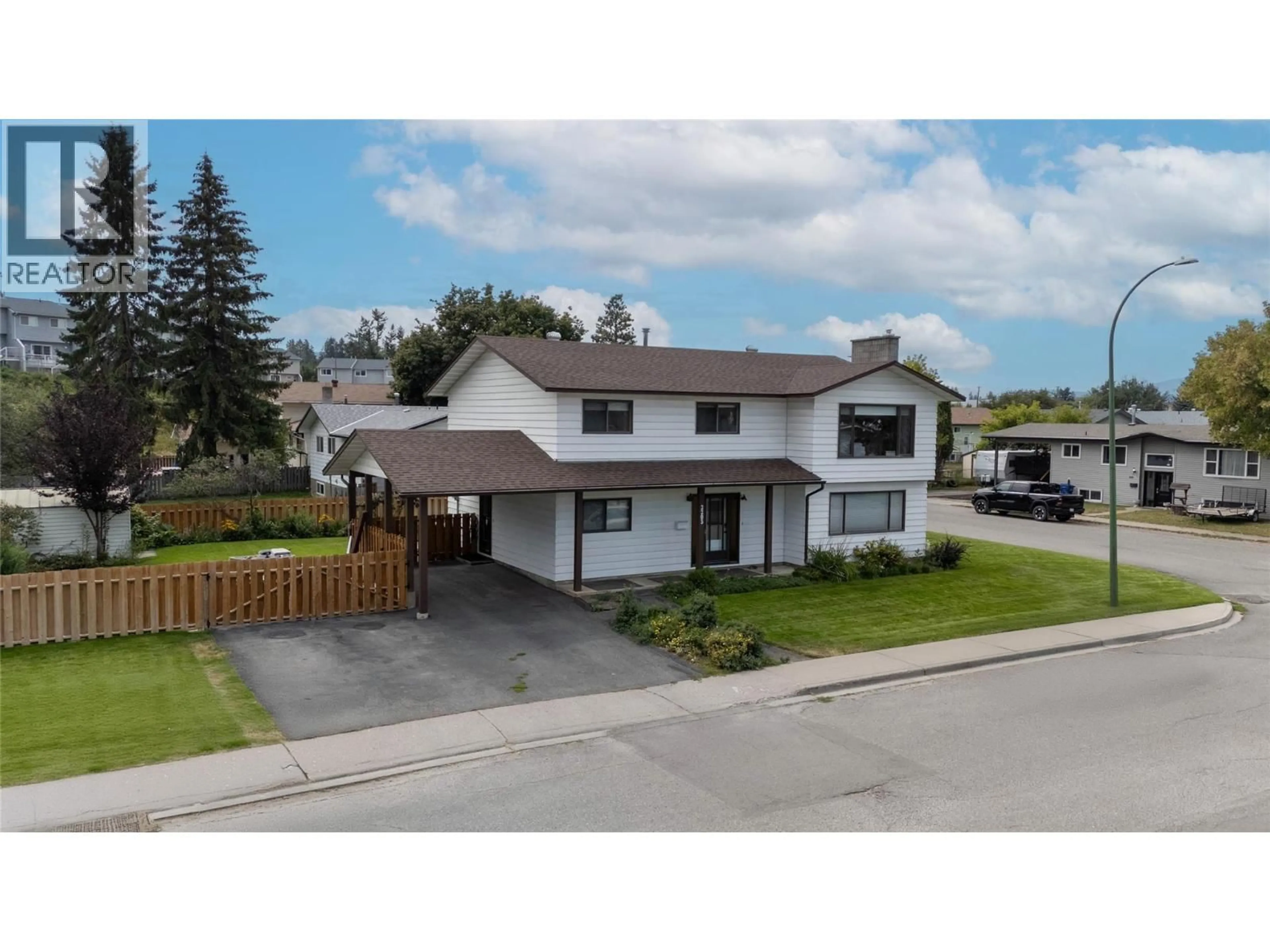 A pic from outside/outdoor area/front of a property/back of a property/a pic from drone, street for 2203 5TH STREET NORTH, Cranbrook British Columbia V1C5B7