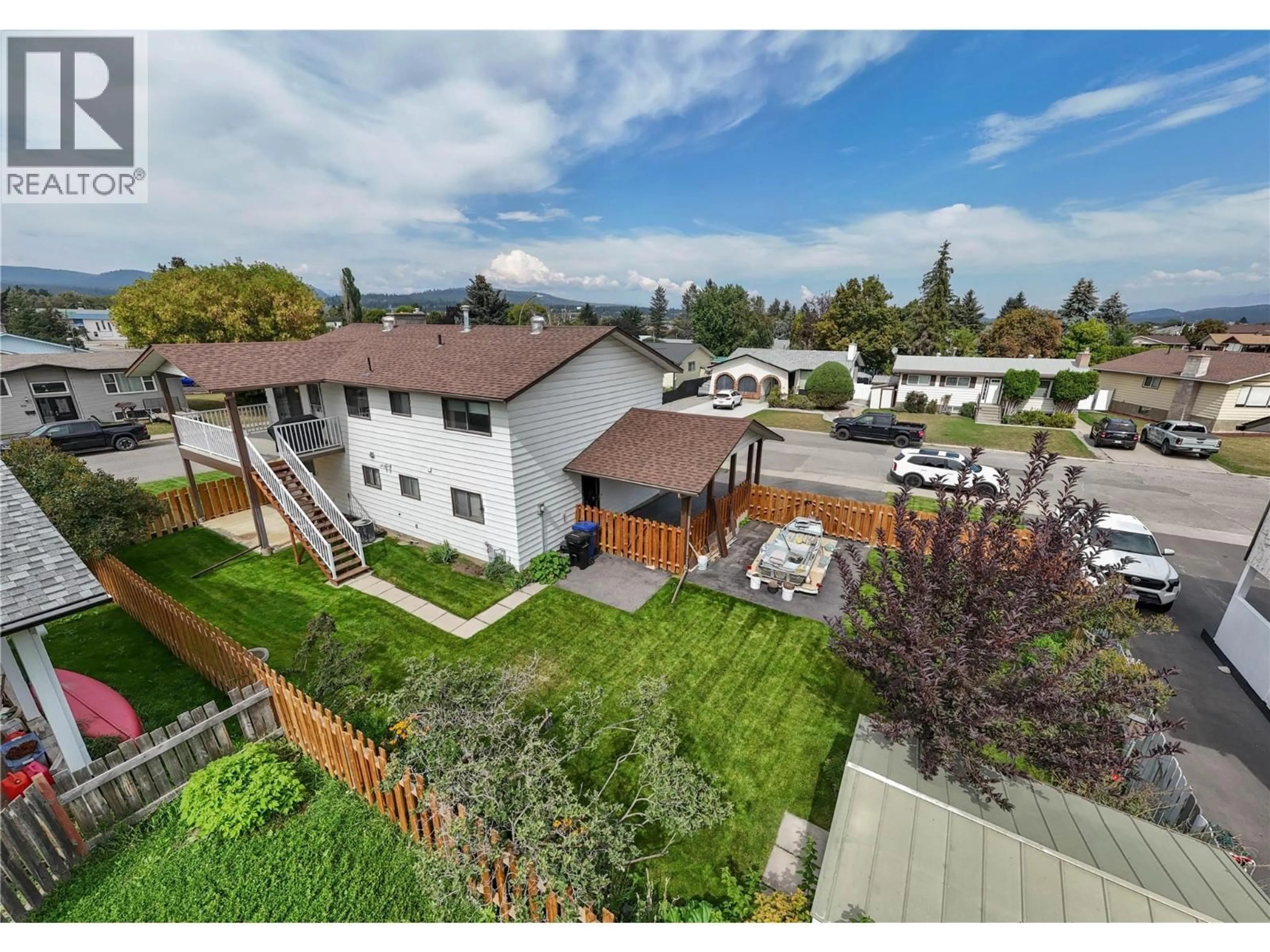A pic from outside/outdoor area/front of a property/back of a property/a pic from drone, street for 2203 5TH STREET NORTH, Cranbrook British Columbia V1C5B7