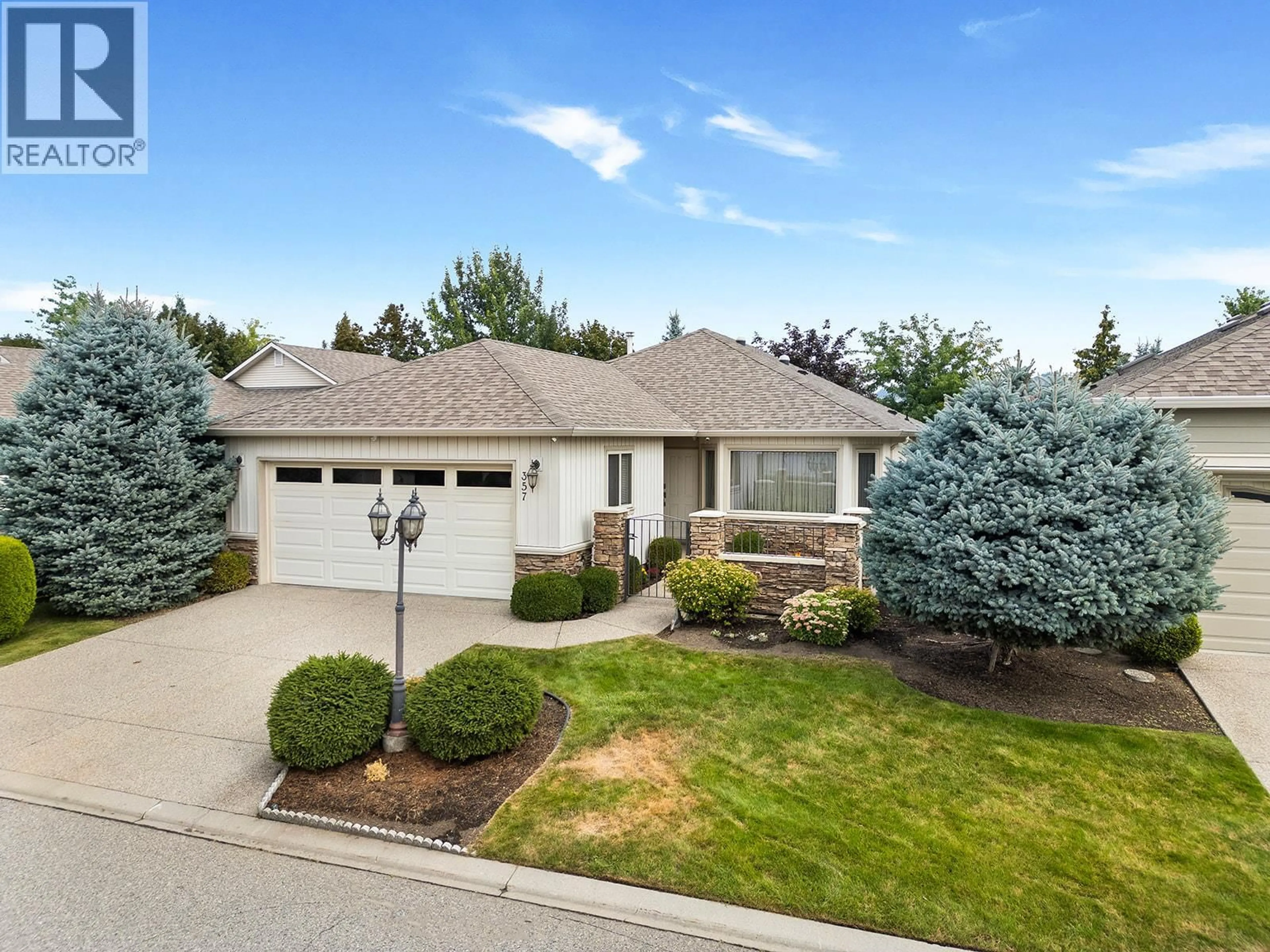 Home with vinyl exterior material, street for 357 - 2365 STILLINGFLEET ROAD, Kelowna British Columbia V1W4X5