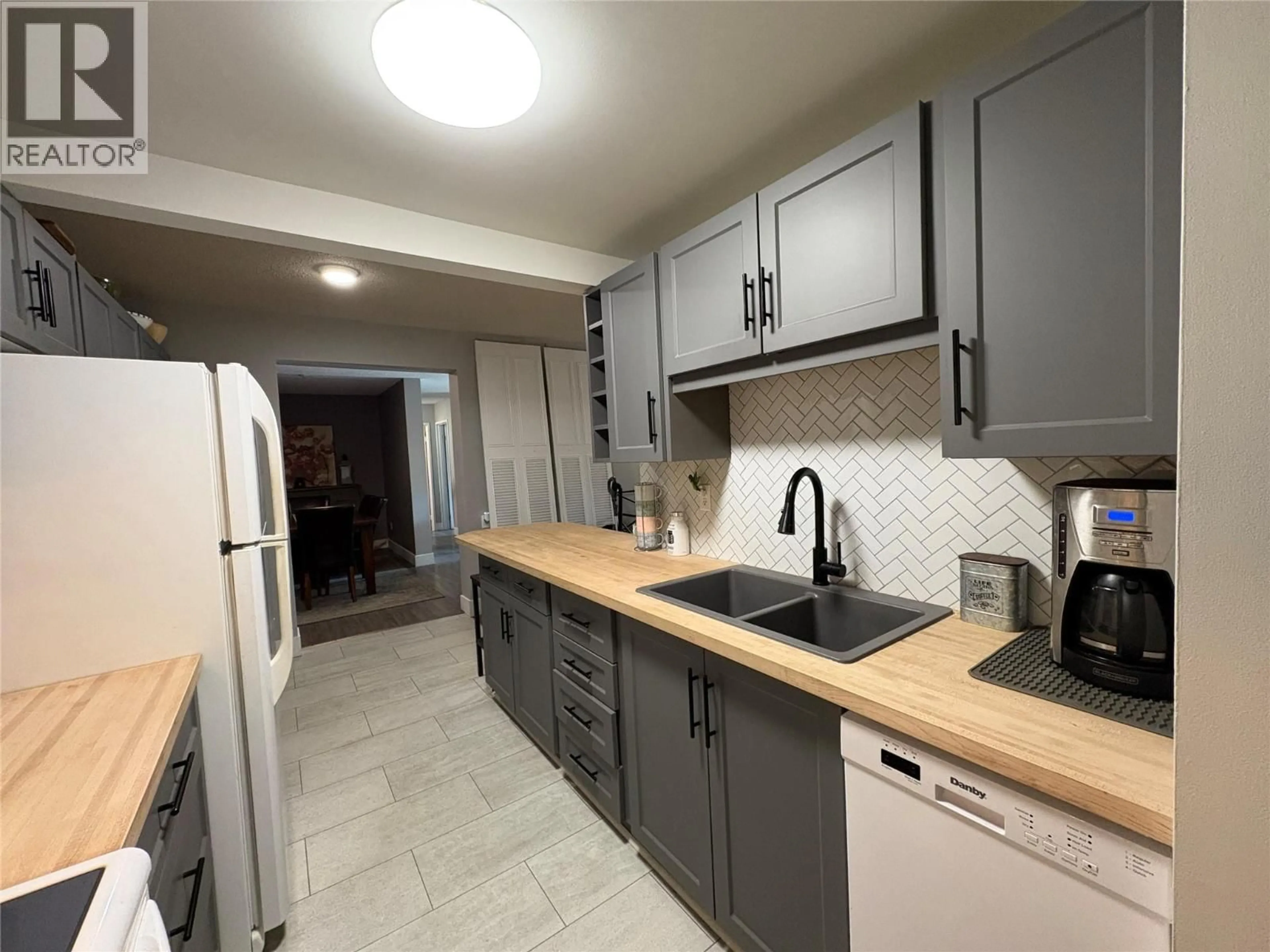Standard kitchen, ceramic/tile floor for 213 - 308 CHARTRAND AVENUE, Logan Lake British Columbia V0K1W0
