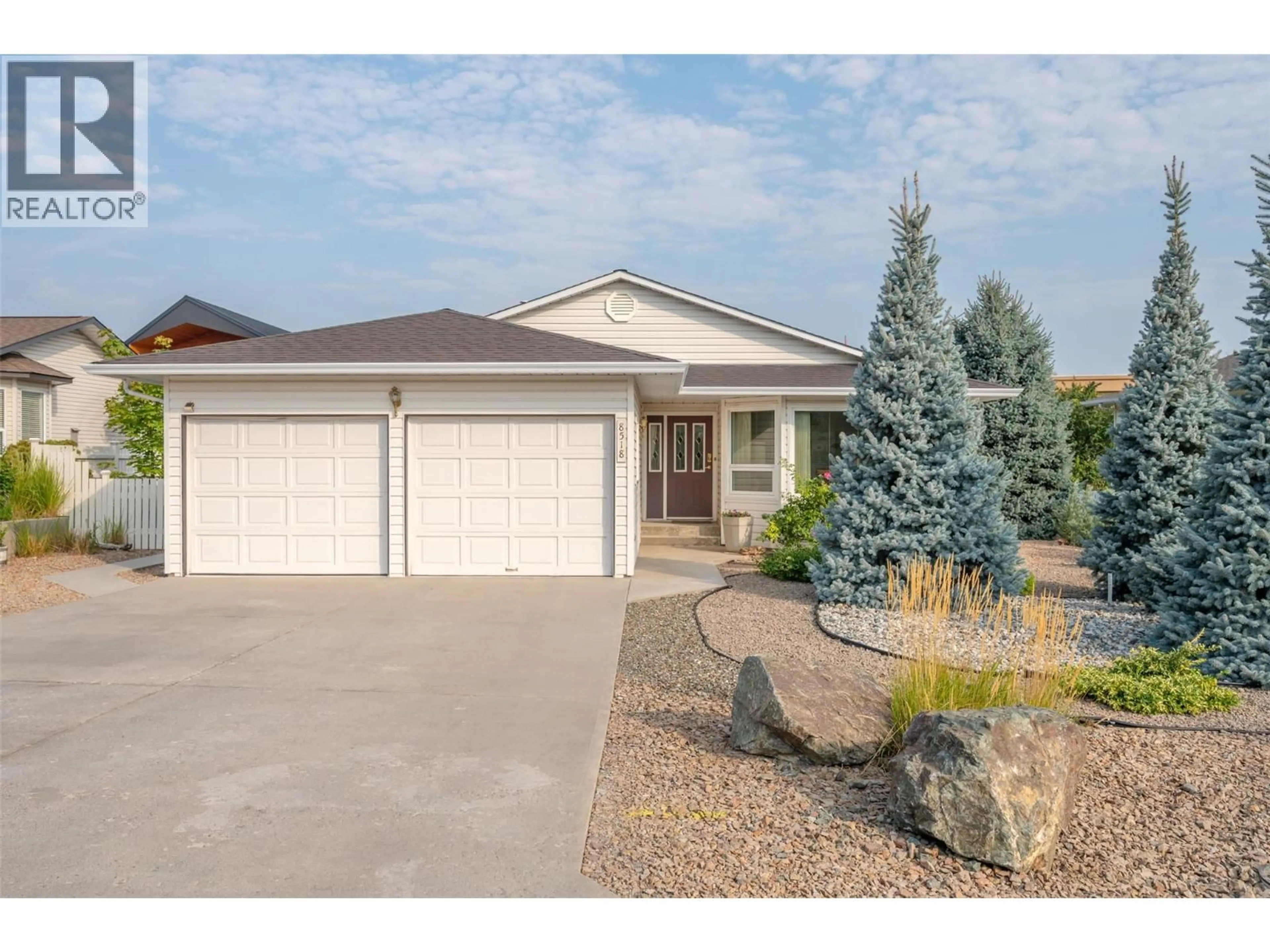 Home with vinyl exterior material, street for 8518 PRIMROSE LANE, Osoyoos British Columbia V0H1V1