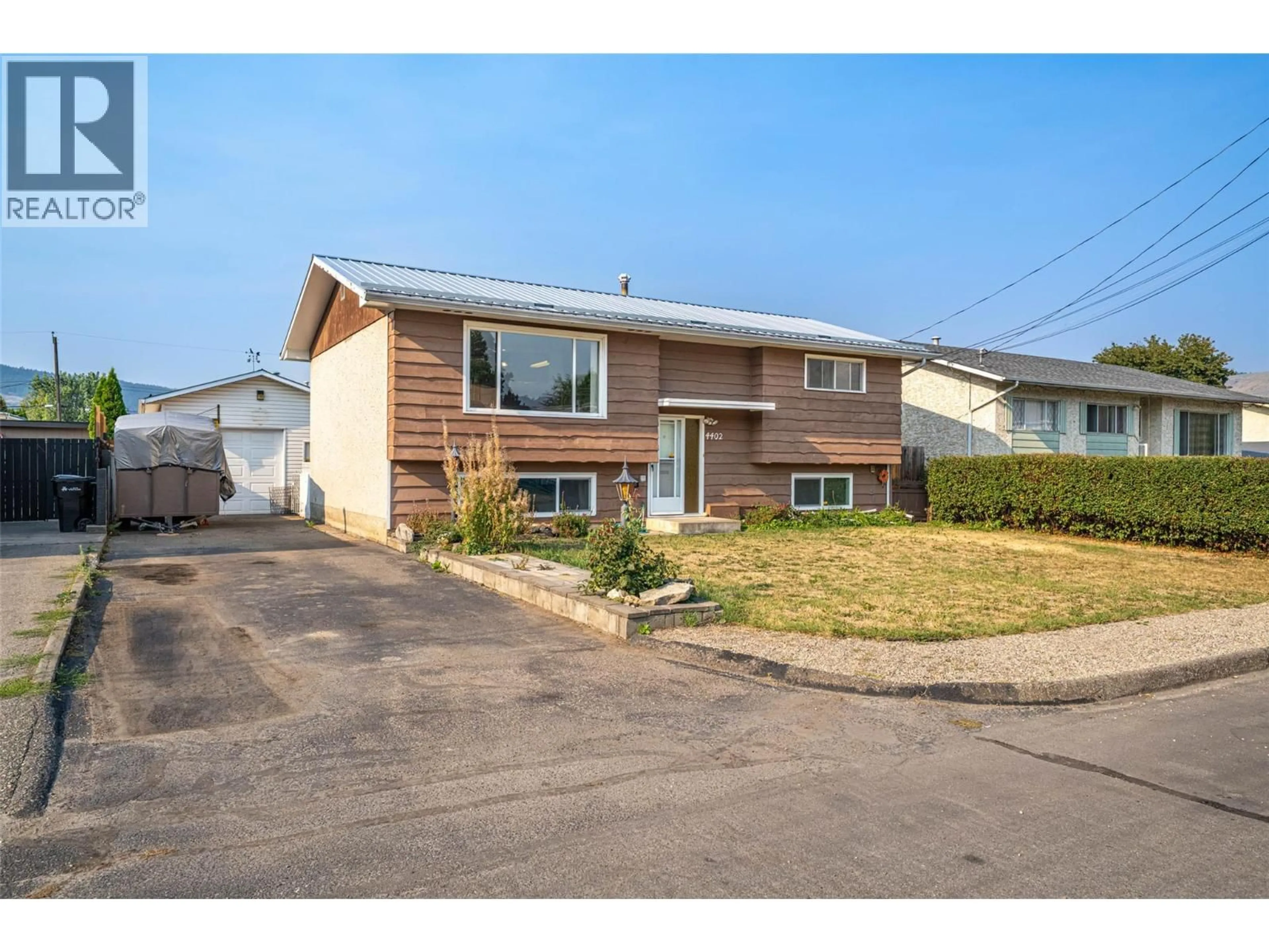 Home with vinyl exterior material, street for 4402 16 AVENUE, Vernon British Columbia V1T6P4
