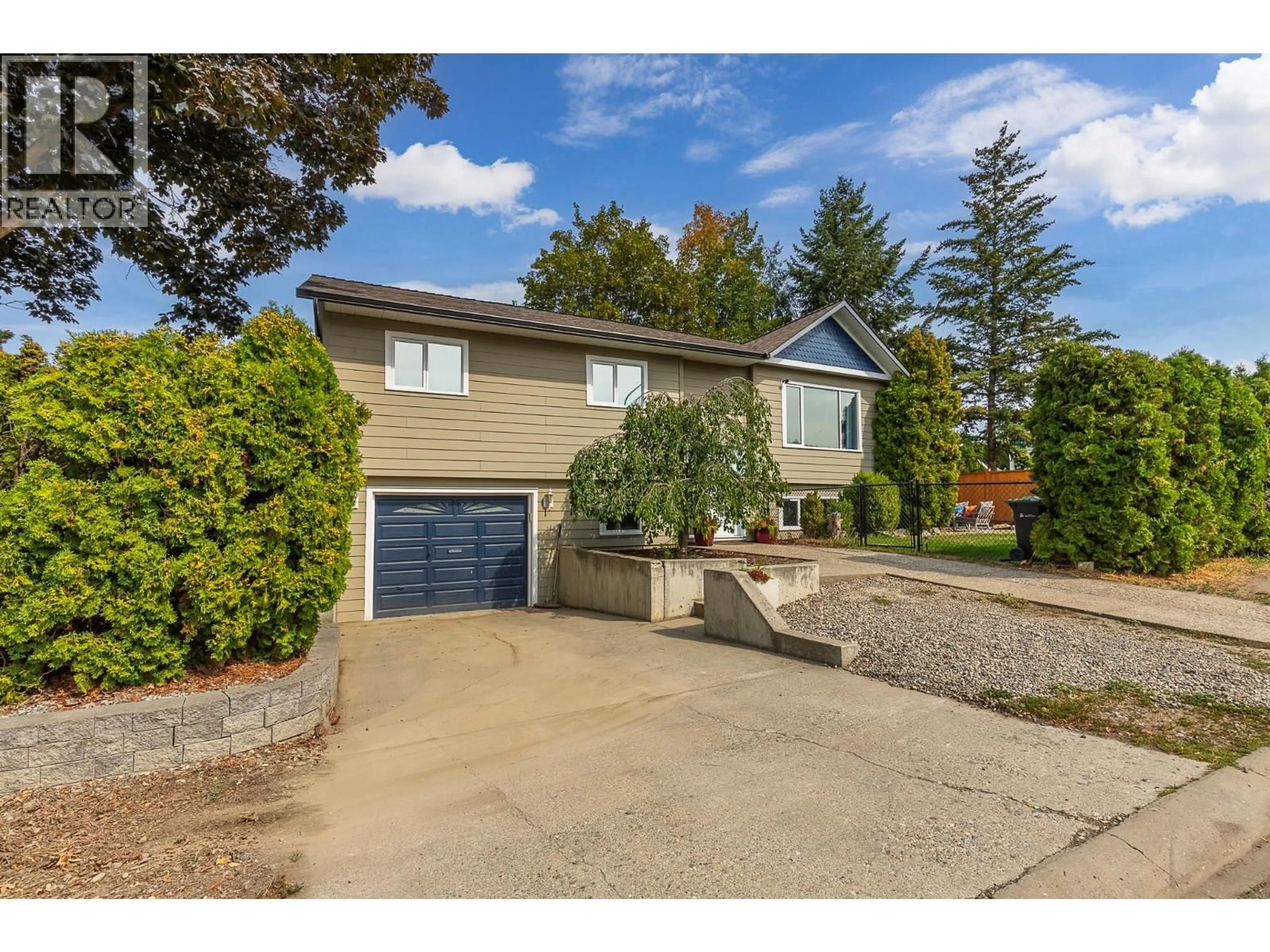 A pic from outside/outdoor area/front of a property/back of a property/a pic from drone, street for 2401 40 AVENUE, Vernon British Columbia V1T9A4