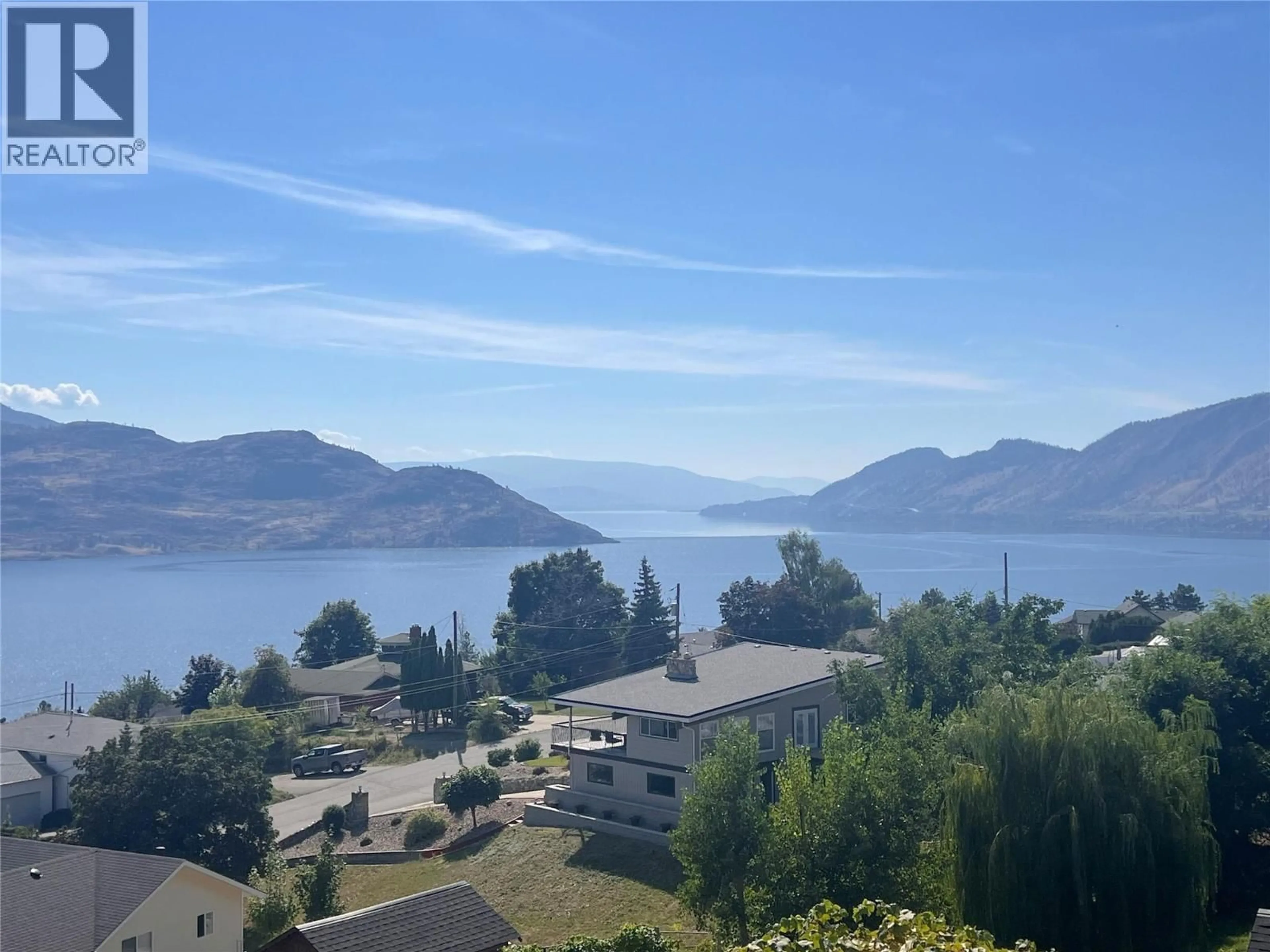 A pic from outside/outdoor area/front of a property/back of a property/a pic from drone, water/lake/river/ocean view for 6045 ELLISON AVENUE, Peachland British Columbia V0H1X4