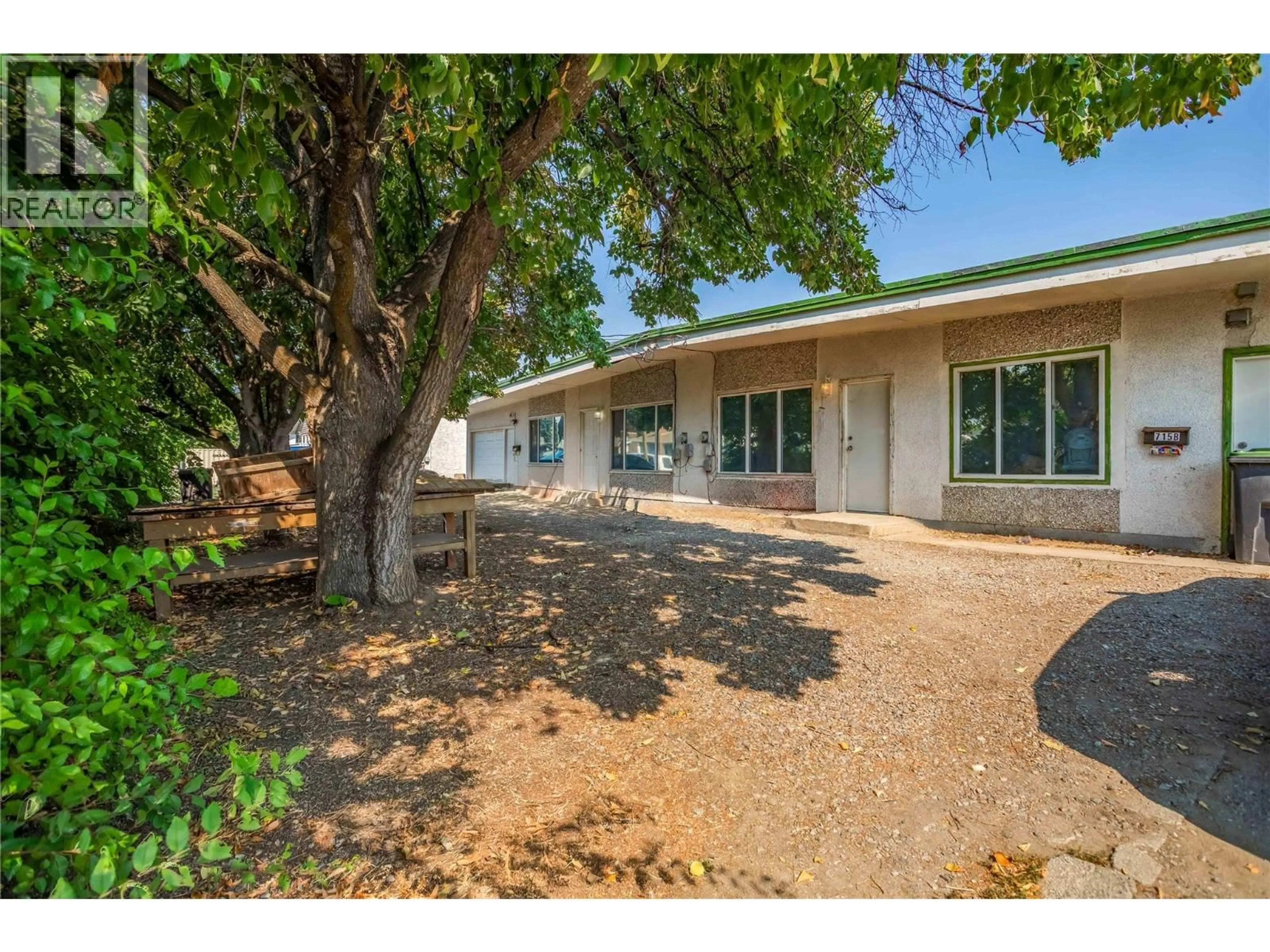 A pic from outside/outdoor area/front of a property/back of a property/a pic from drone, street for 715B GERSTMAR ROAD, Kelowna British Columbia V1X4B4