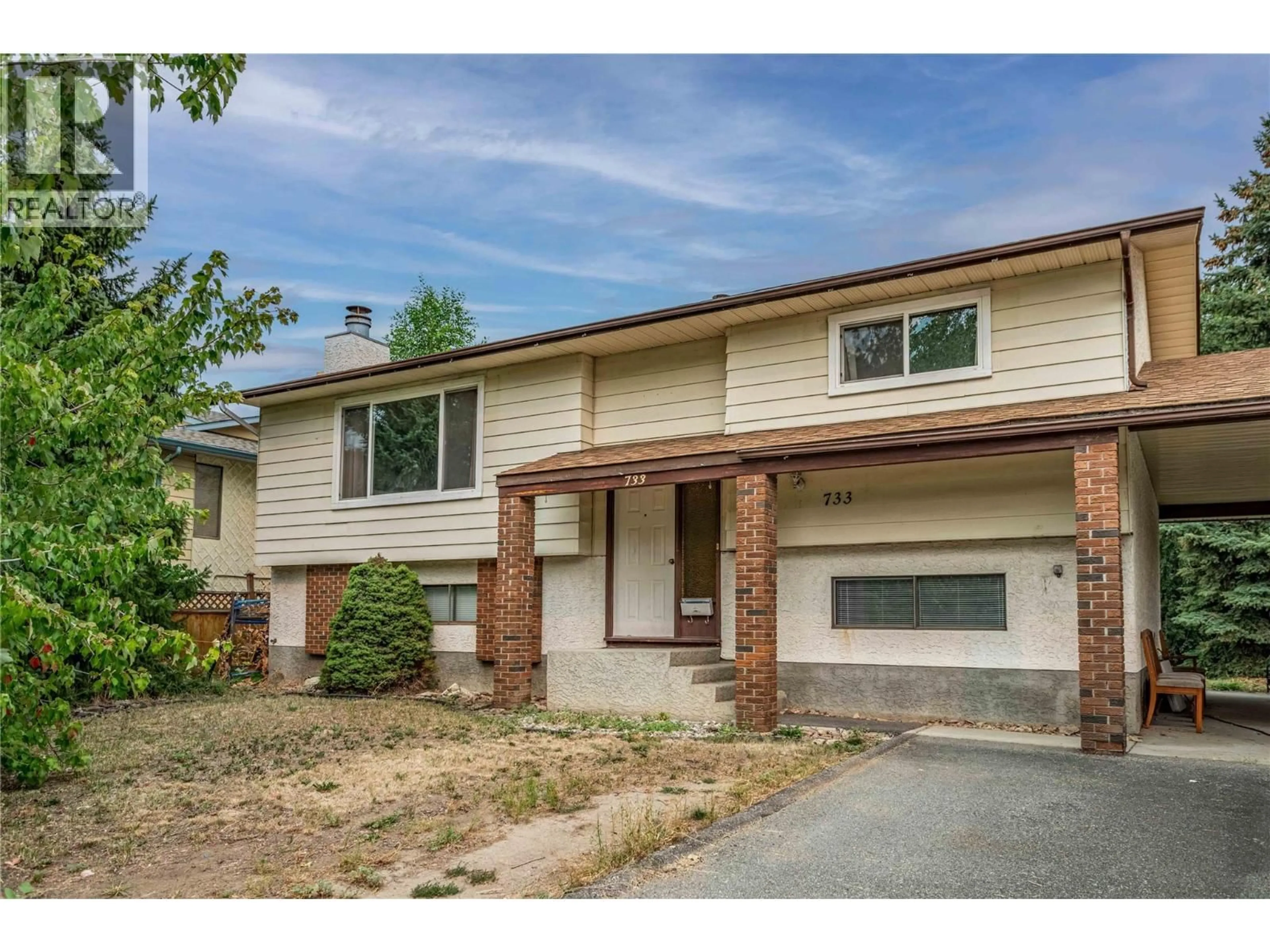 Home with brick exterior material, street for 733 JOSSELYN COURT, Kelowna British Columbia V1X5Y9