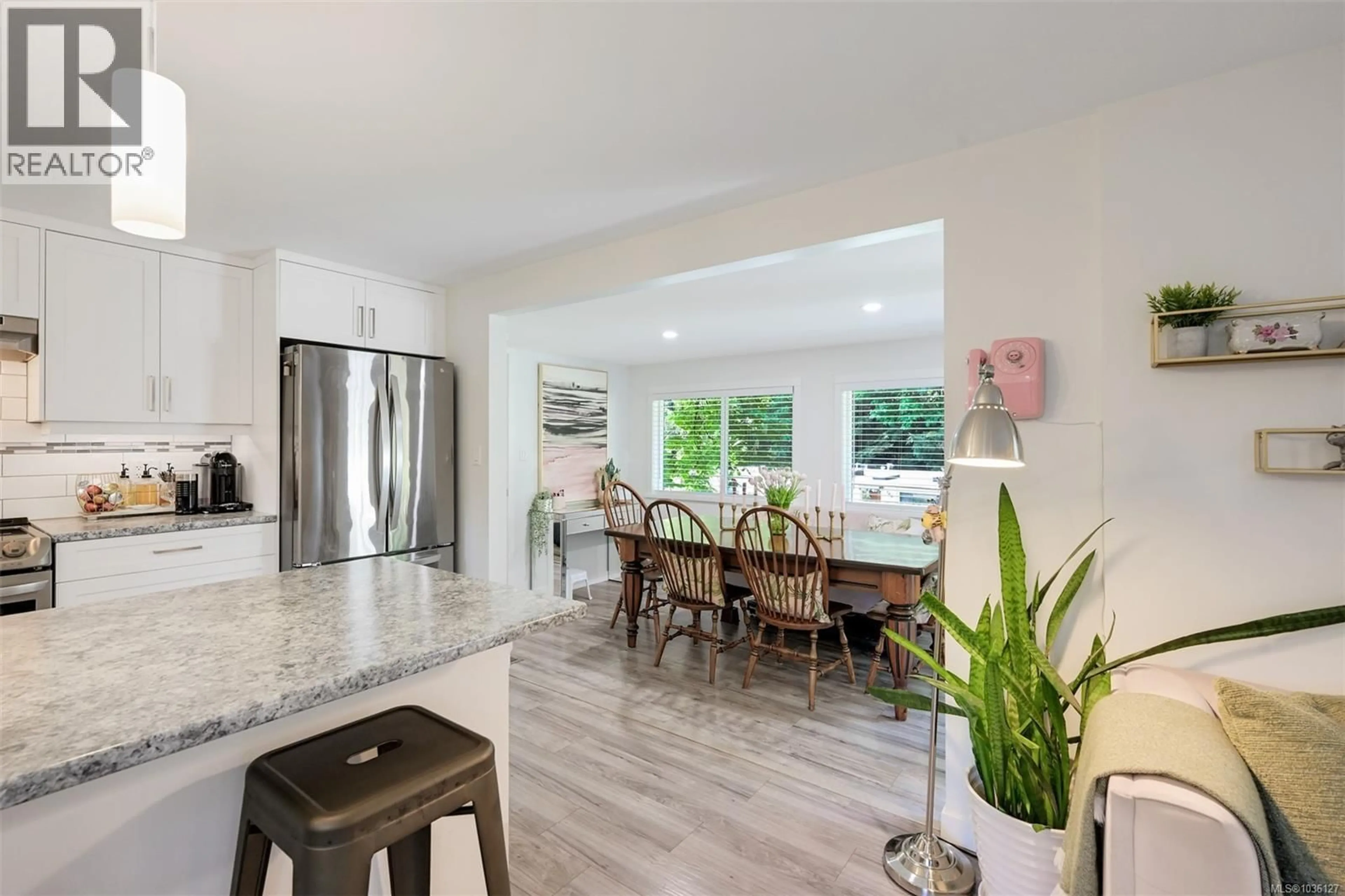 Open concept kitchen, ceramic/tile floor for 103 - 2500 FLORENCE LAKE ROAD, Langford British Columbia V9B4H2
