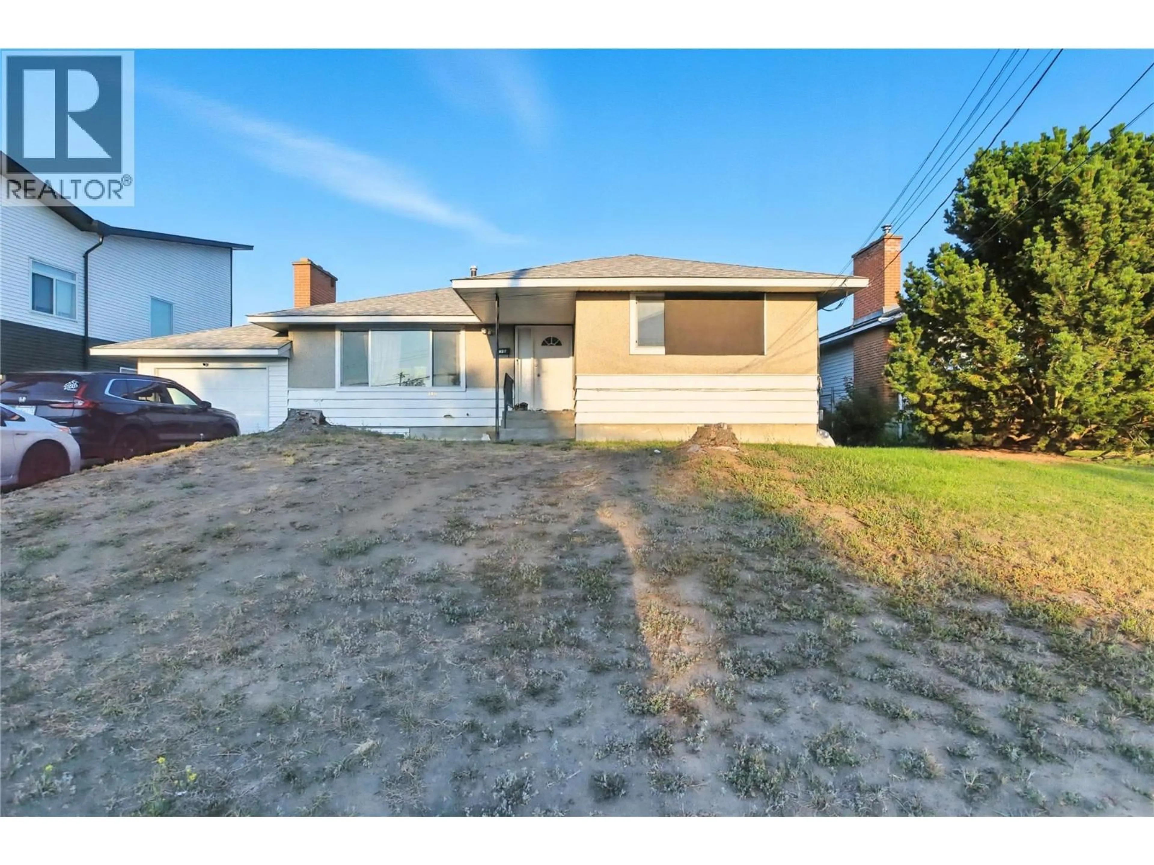 A pic from outside/outdoor area/front of a property/back of a property/a pic from drone, street for 740 10TH STREET, Kamloops British Columbia V2B2Z7