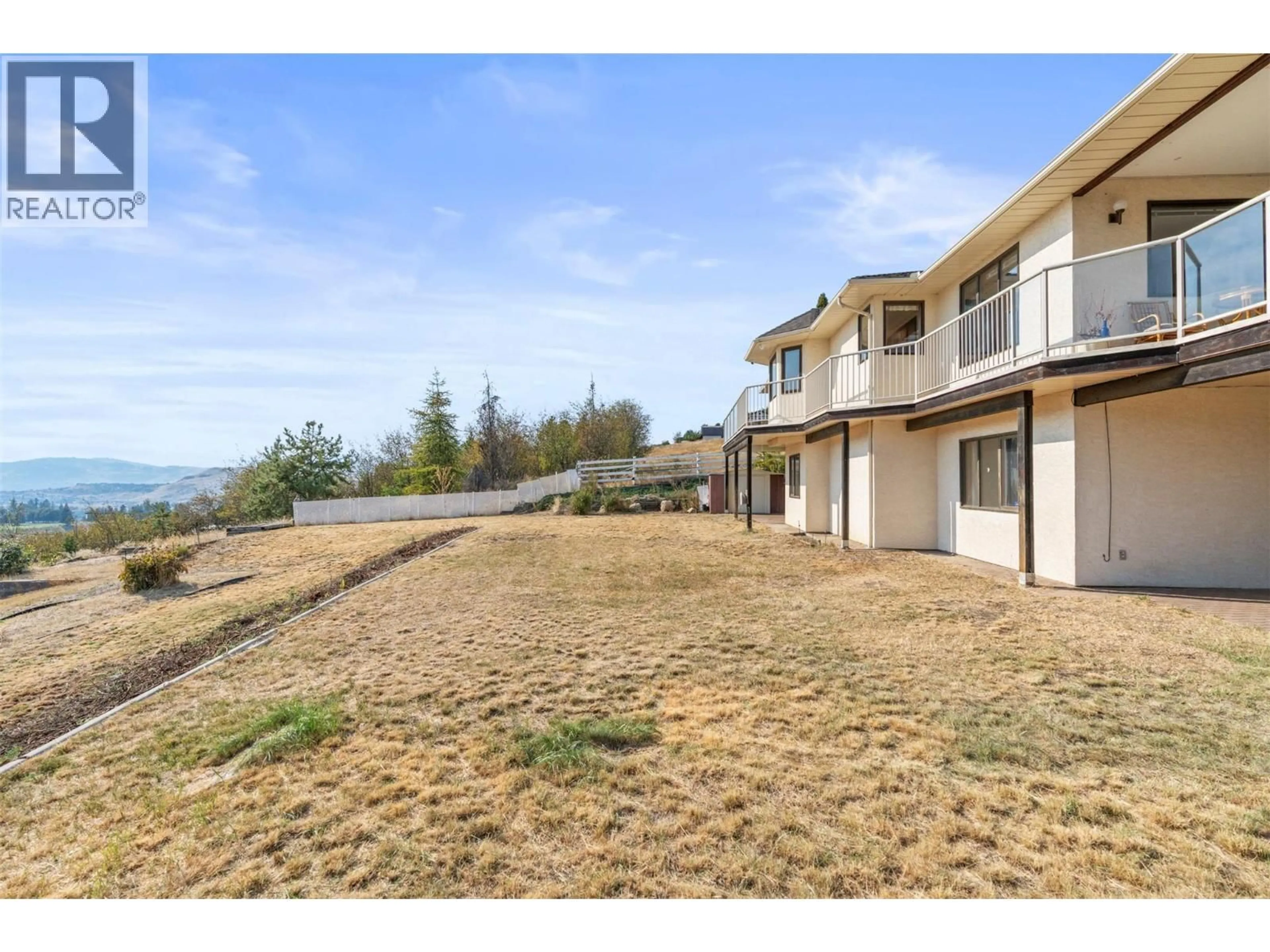 A pic from outside/outdoor area/front of a property/back of a property/a pic from drone, water/lake/river/ocean view for 308 CYPRESS DRIVE, Coldstream British Columbia V1B2Y1