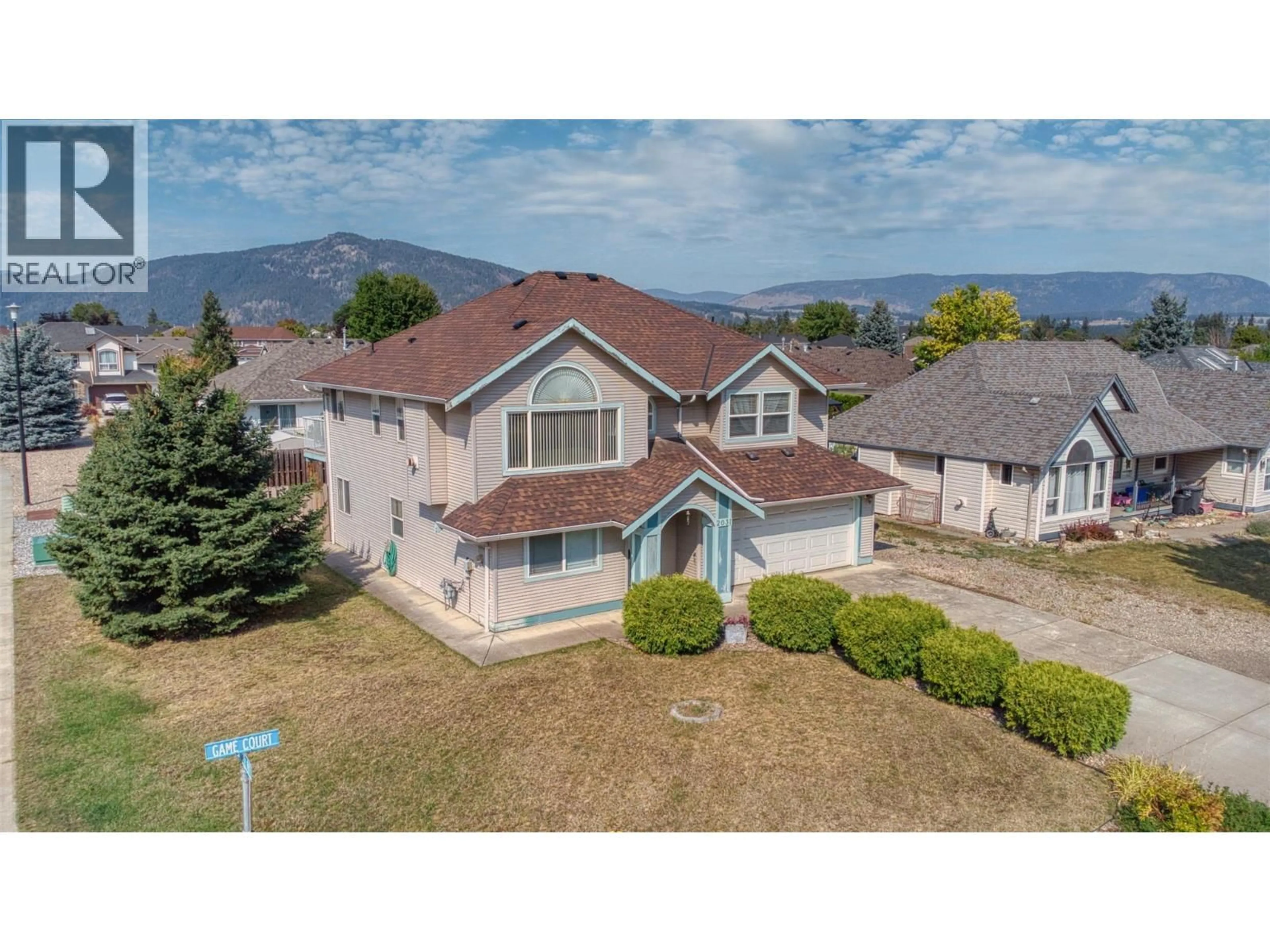 A pic from outside/outdoor area/front of a property/back of a property/a pic from drone, mountain view for 2031 GAME COURT, Armstrong British Columbia V0E1B1