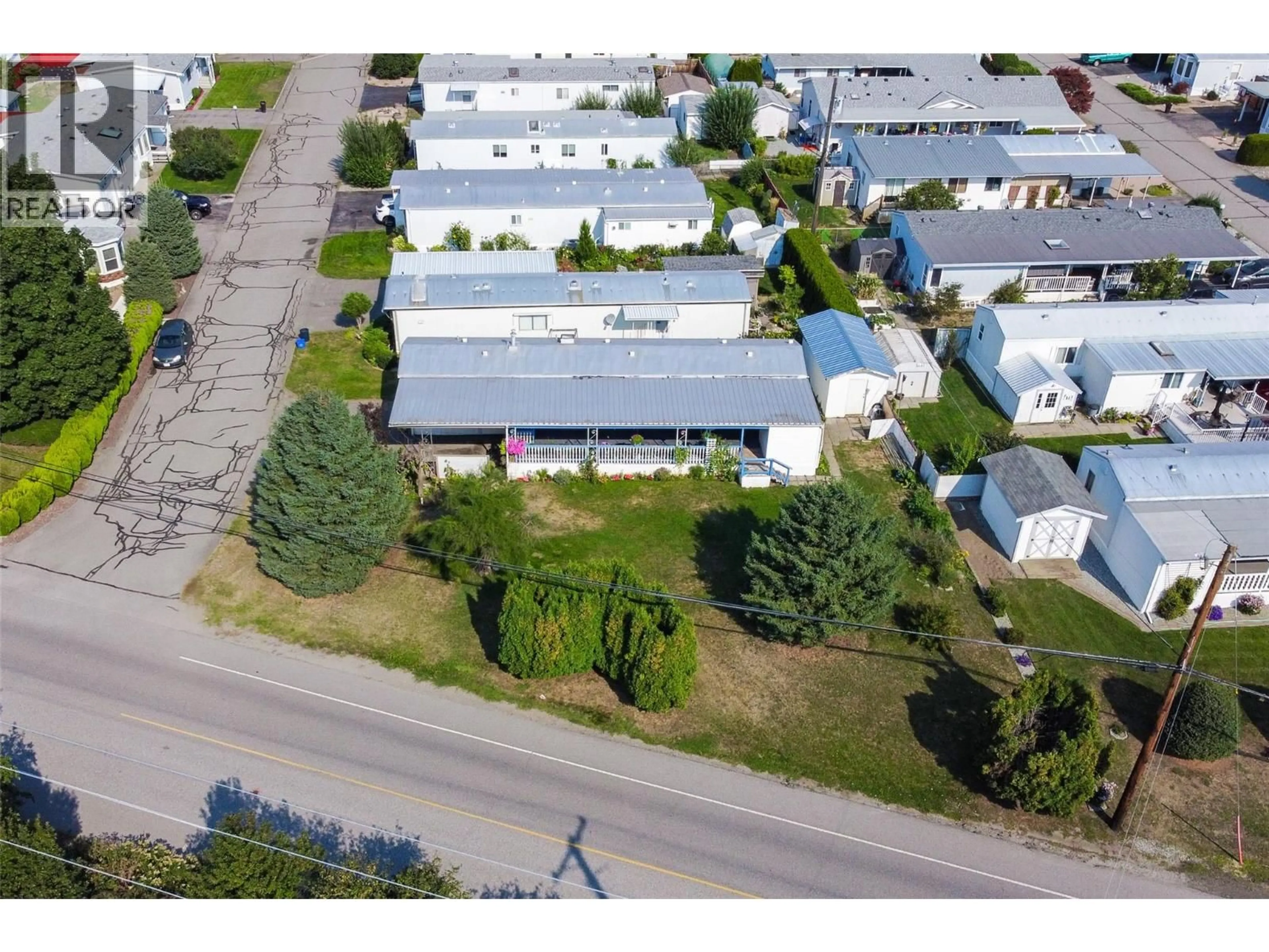 A pic from outside/outdoor area/front of a property/back of a property/a pic from drone, street for 140 - 720 COMMONWEALTH ROAD, Kelowna British Columbia V4V1R9