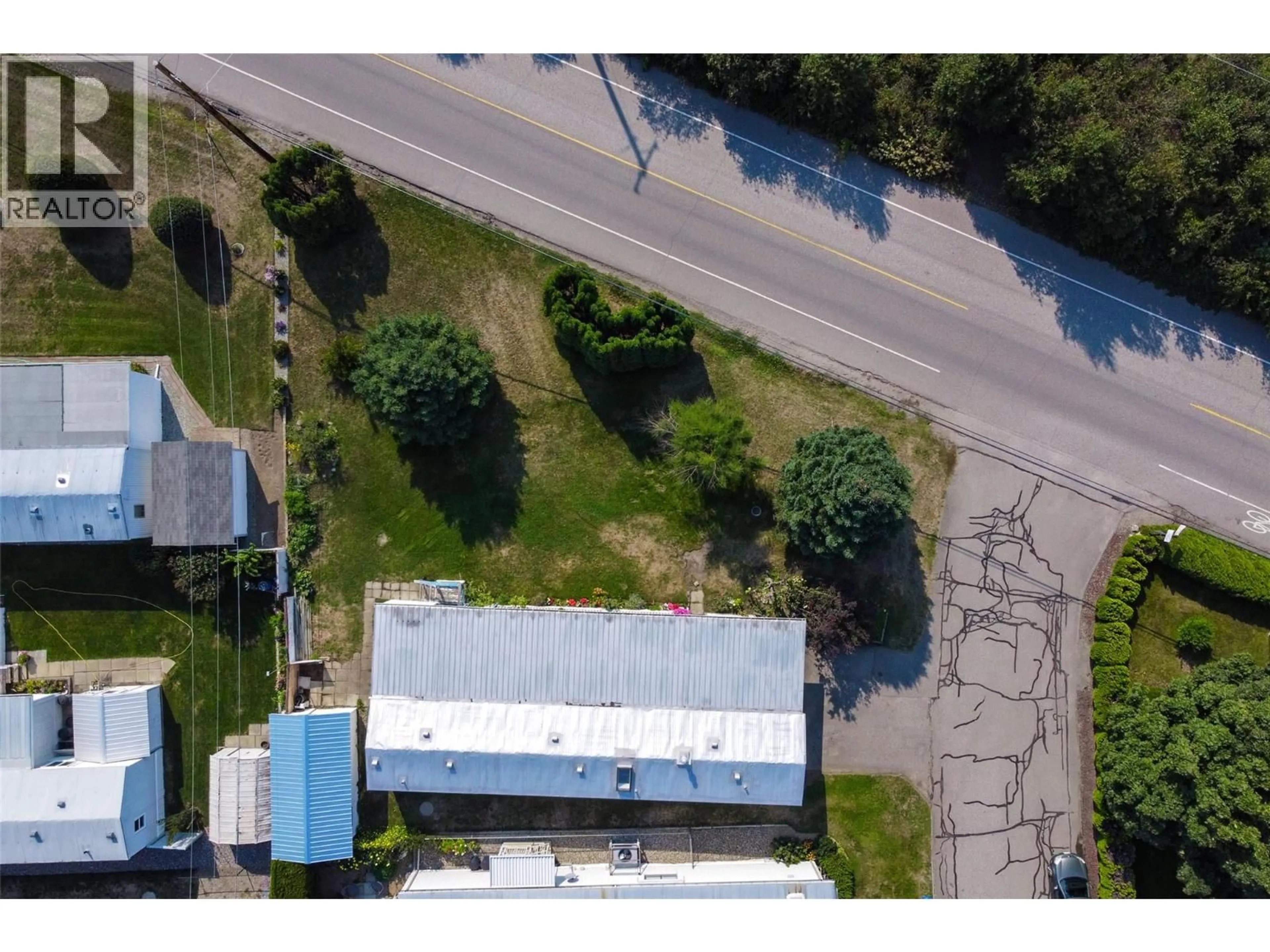 A pic from outside/outdoor area/front of a property/back of a property/a pic from drone, street for 140 - 720 COMMONWEALTH ROAD, Kelowna British Columbia V4V1R9
