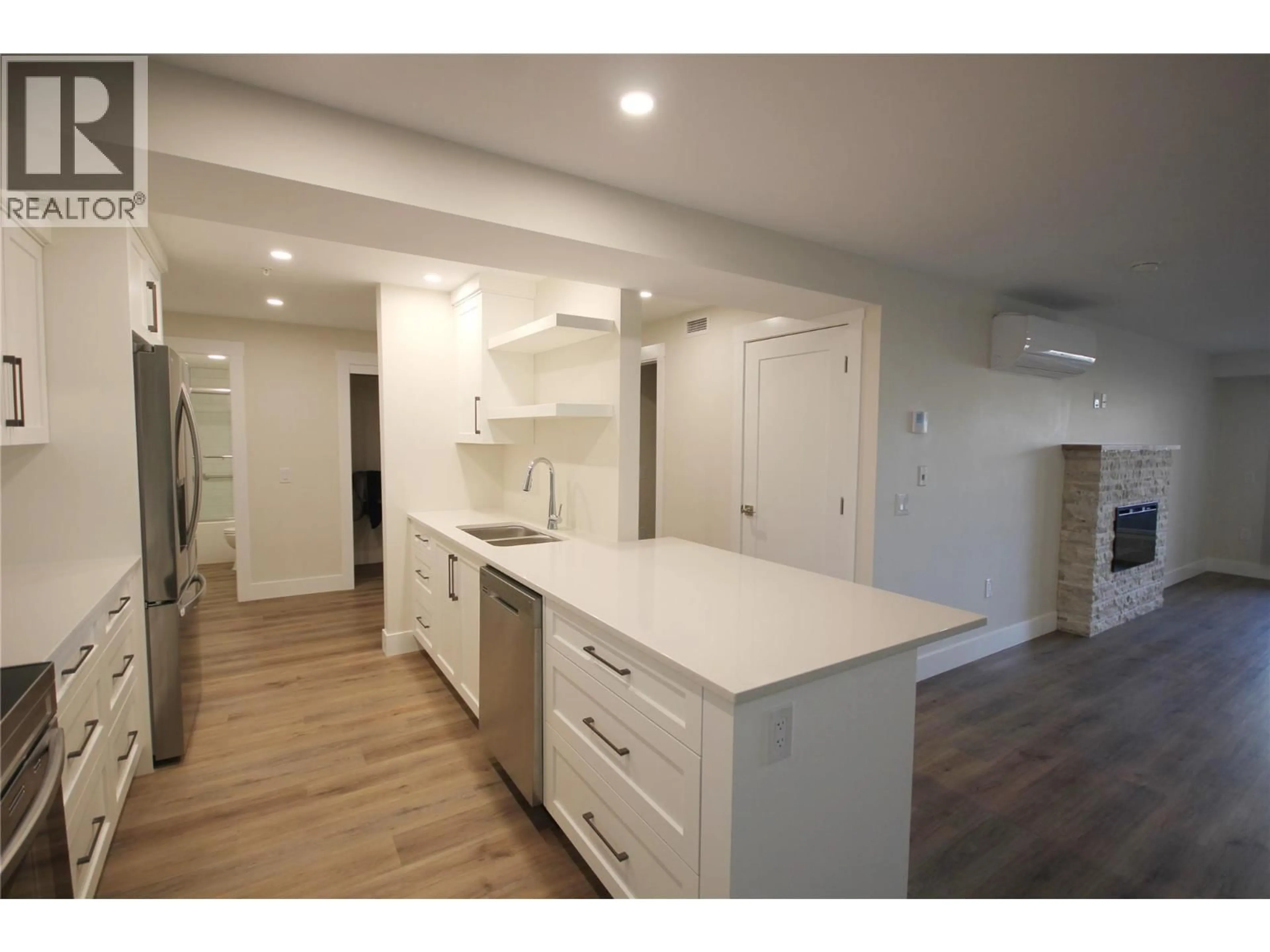 Open concept kitchen, unknown for 209 - 217 ELM AVENUE, Penticton British Columbia V2A3W1