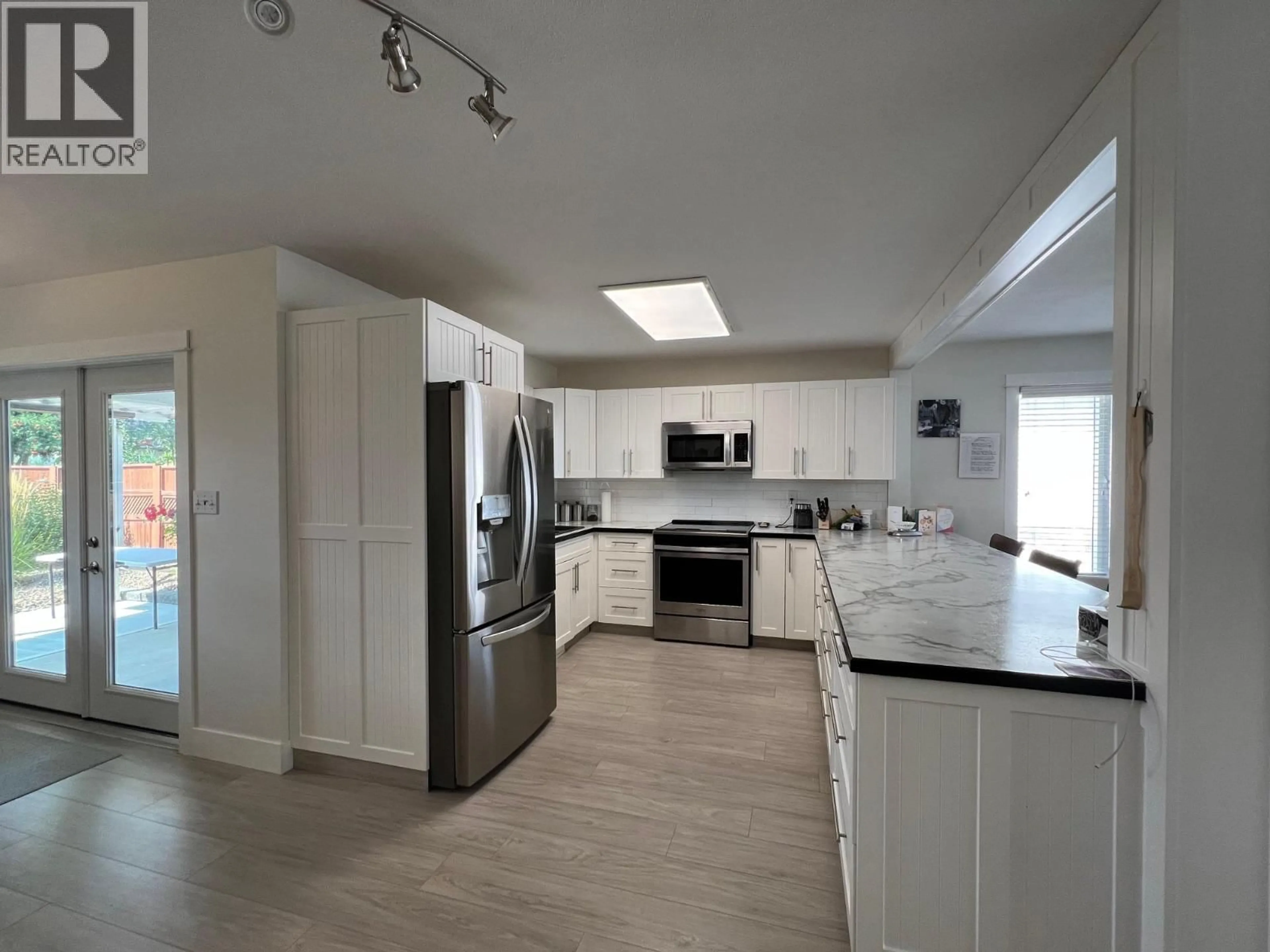 Open concept kitchen, unknown for 821 8TH AVENUE, Vernon British Columbia V1H1Z1