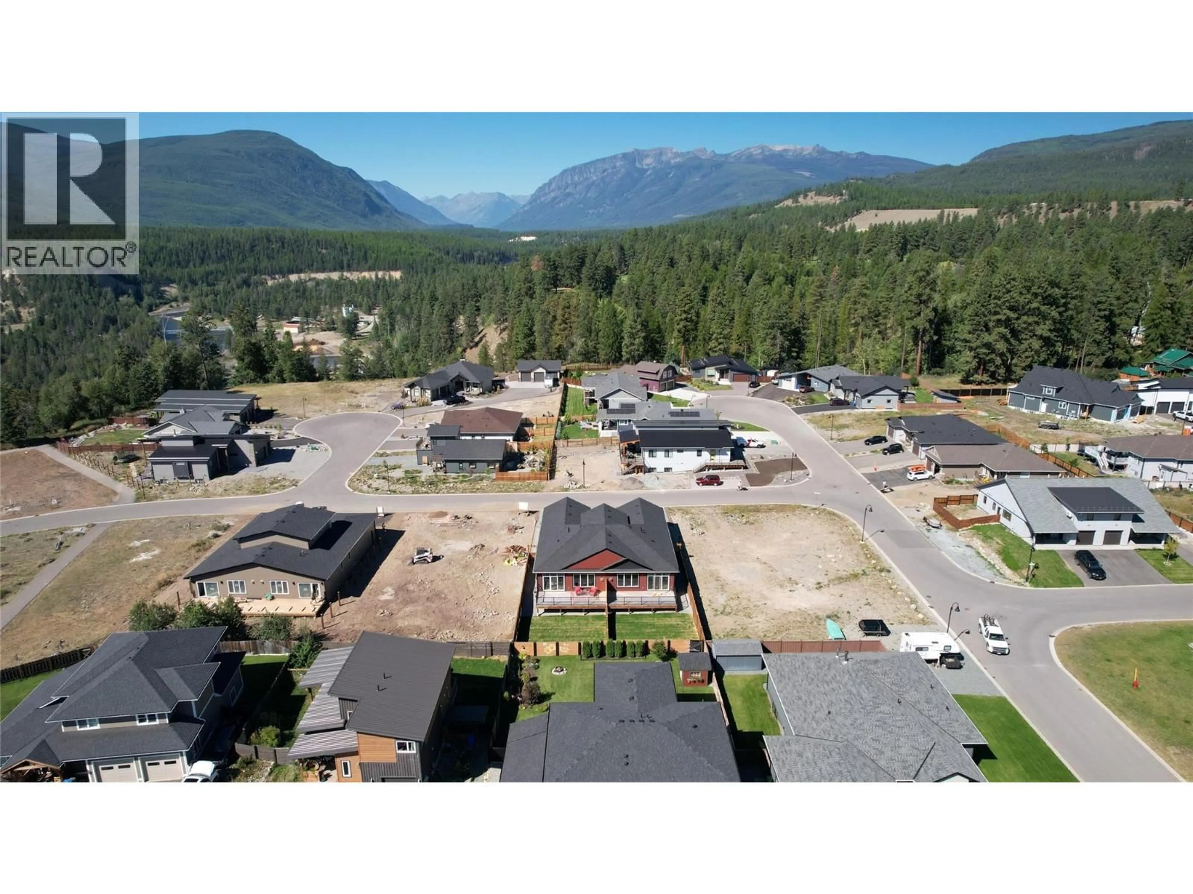 A pic from outside/outdoor area/front of a property/back of a property/a pic from drone, mountain view for 718 ST MARY RIVER DRIVE, Kimberley British Columbia V1A3J3