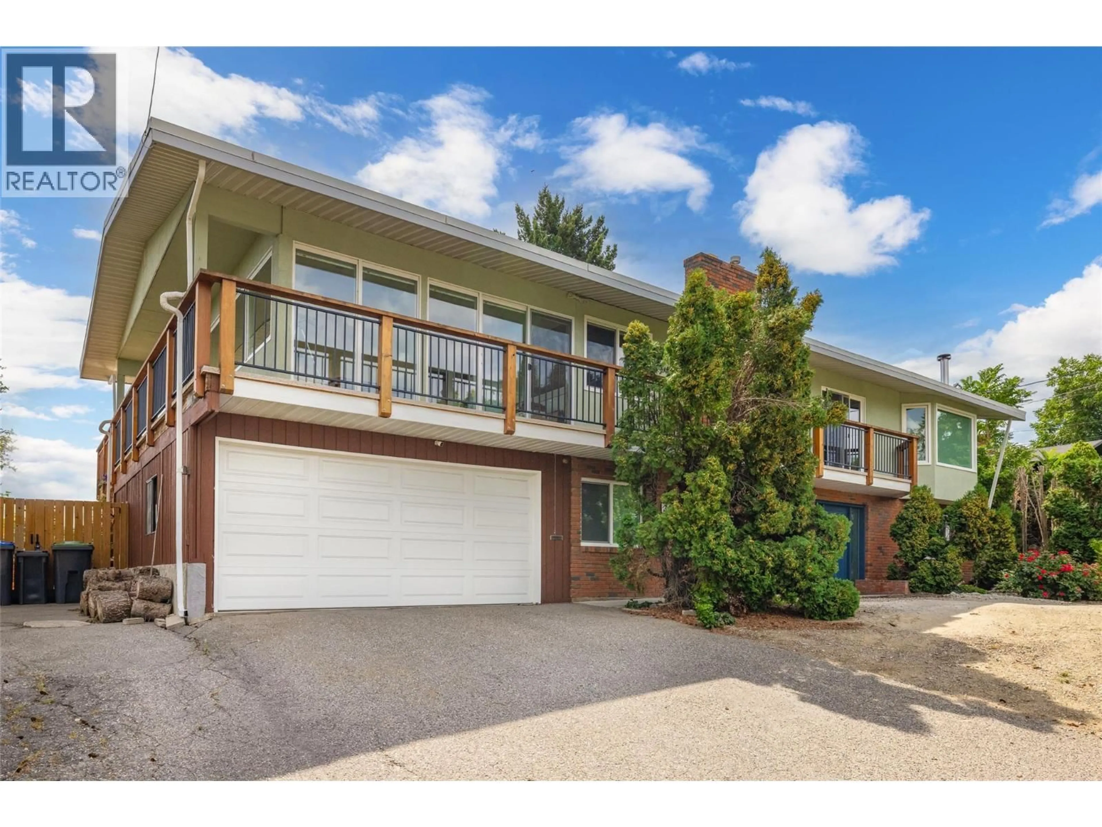 A pic from outside/outdoor area/front of a property/back of a property/a pic from drone, street for 2415 COLLINGWOOD ROAD, West Kelowna British Columbia V1Z2C3