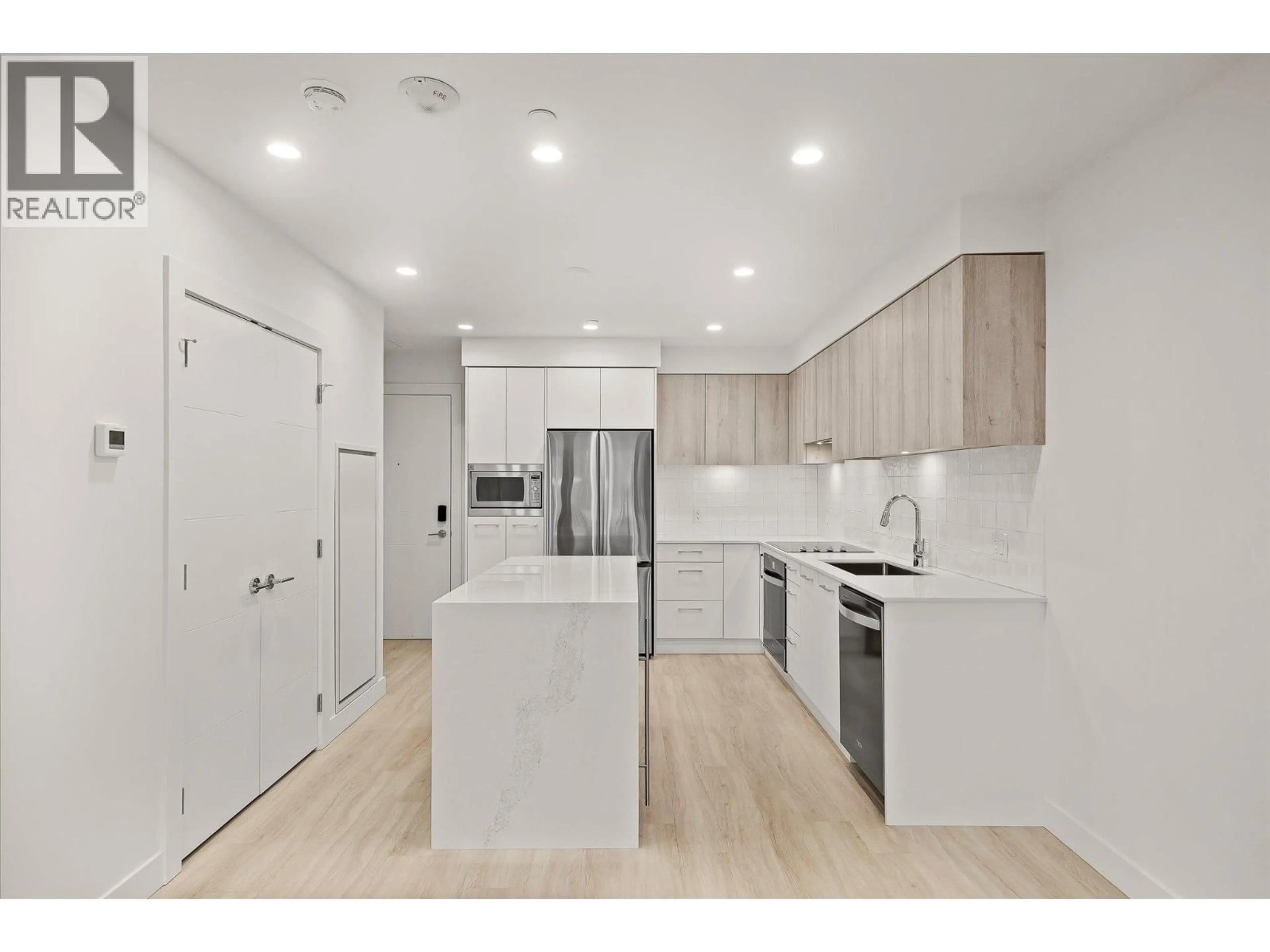Open concept kitchen, unknown for 108 - 3699 CAPOZZI ROAD, Kelowna British Columbia V1W0G3